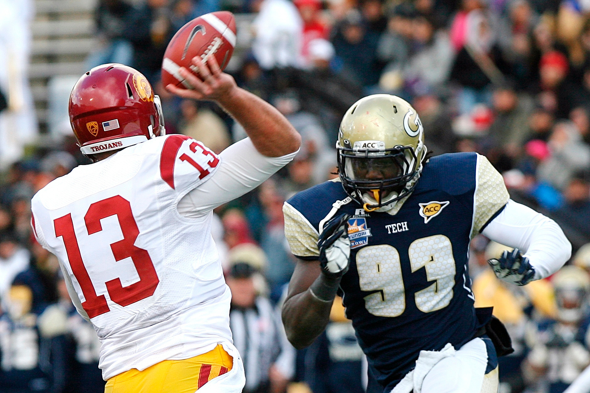 Southern California quarterback Max Wittek (13) is rushed by Georgia Tech defensive end Emmanuel Dieke (93). (AP Photo/Mark Lambie)