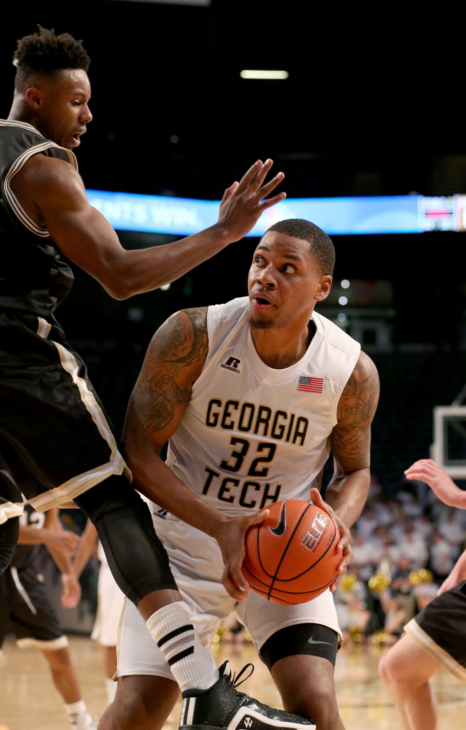 Dec 1, 2015; Atlanta, GA, USA; Georgia Tech Yellow Jackets forward Nick Jacobs (32) makes a move against Wofford Terriers forward Justin Gordon (24) in the second half of their game at McCamish Pavilion. The Yellow Jackets won 77-61. Mandatory Credit: Jason Getz-USA TODAY Sports