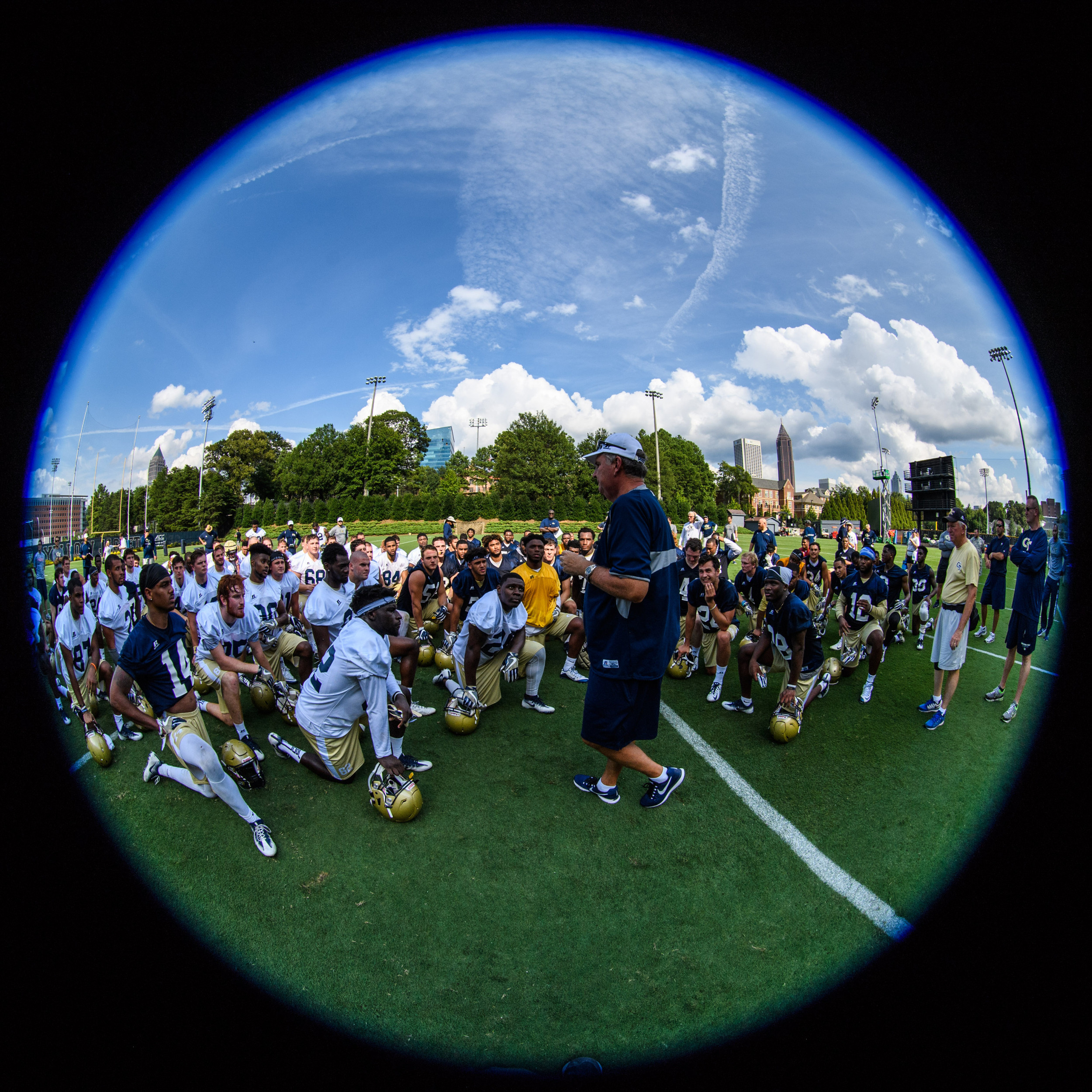 Coach Johnson talks to the team after practice