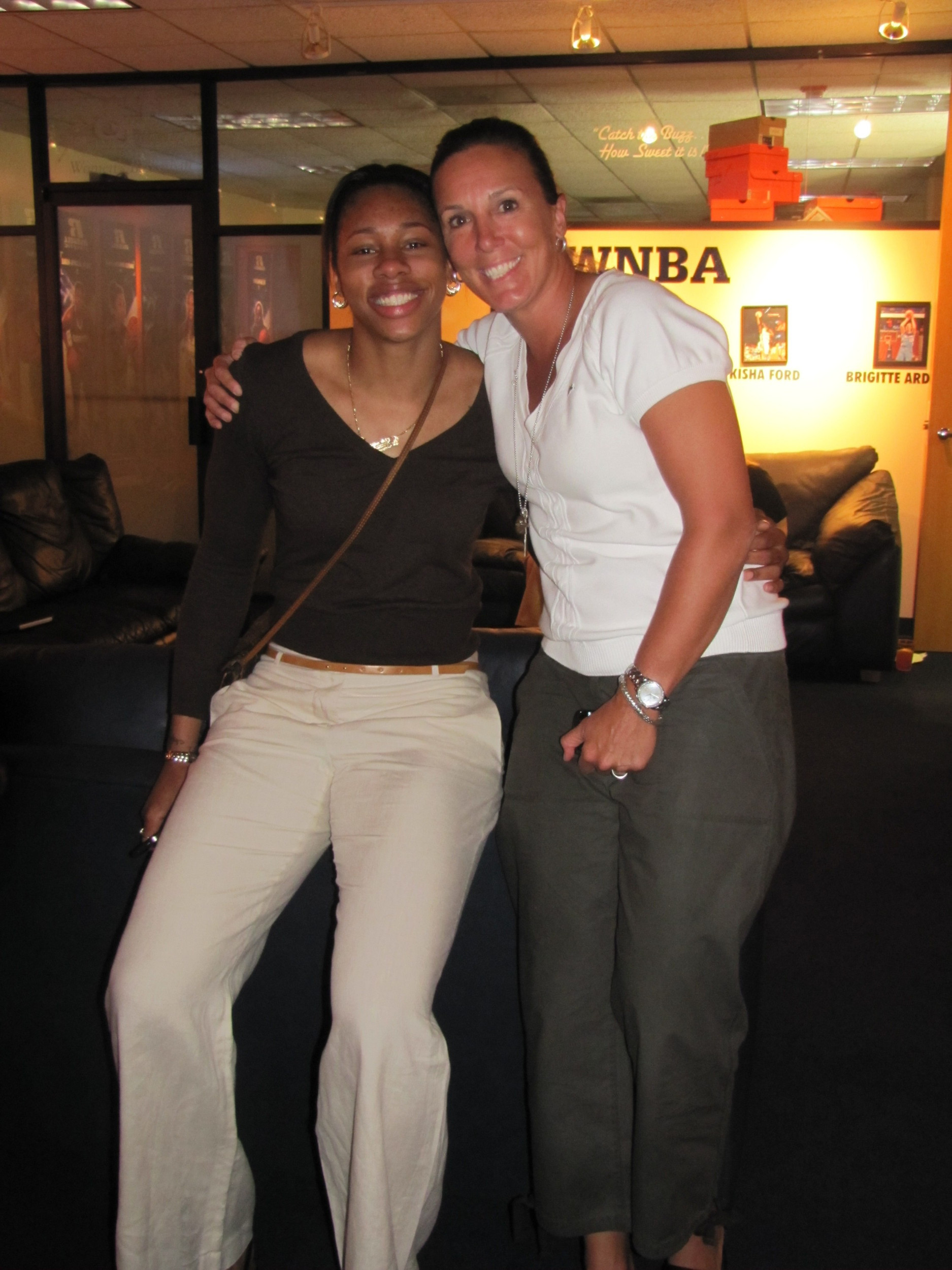 2011 WNBA Draft Party - Alex Montgomery taken in the first round and 10th overall by the New York Liberty - Montgomery with head coach MaChelle Joseph