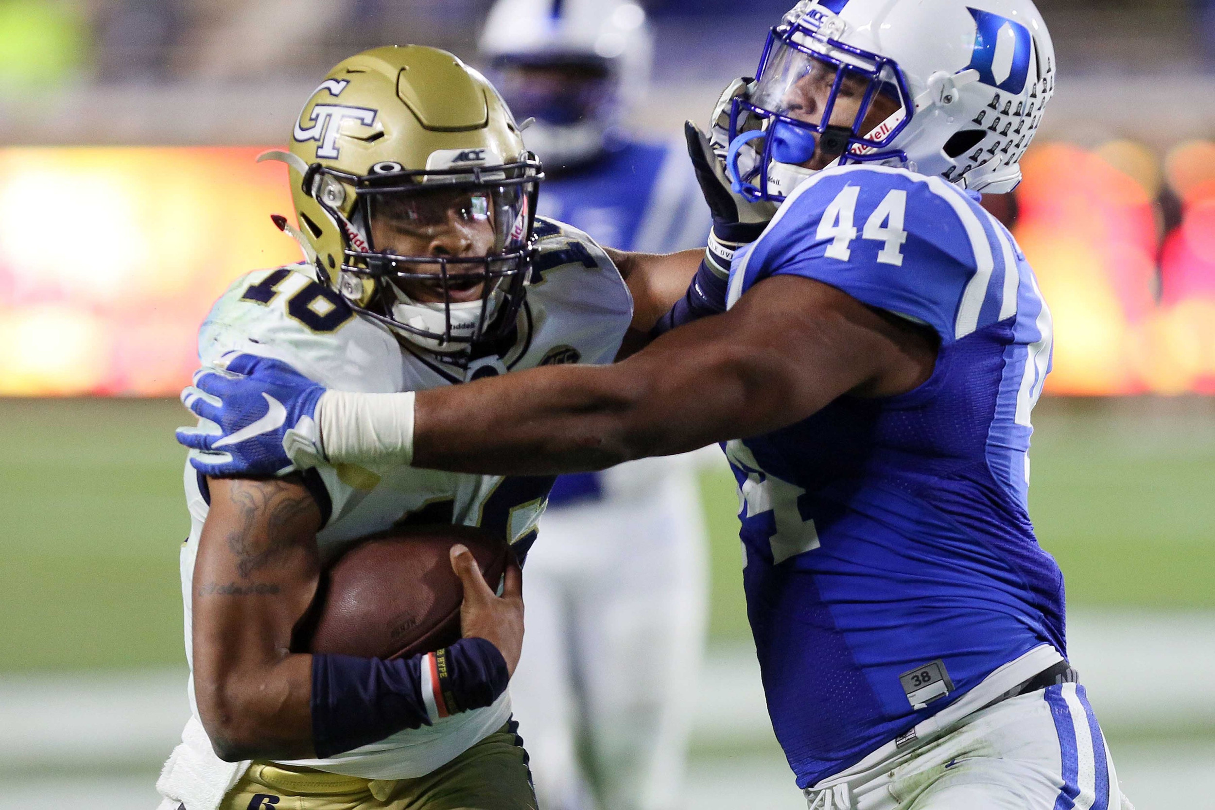 Nov 18, 2017; Durham, NC, USA; Duke Blue Devils linebacker Joe Giles-Harris (44) tackles Georgia Tech Yellow Jackets quarterback TaQuon Marshall (16) in the second half at Wallace Wade Stadium. Duke beat the Georgia Tech 42-20. Mandatory Credit: Mark Dolejs-USA TODAY Sports