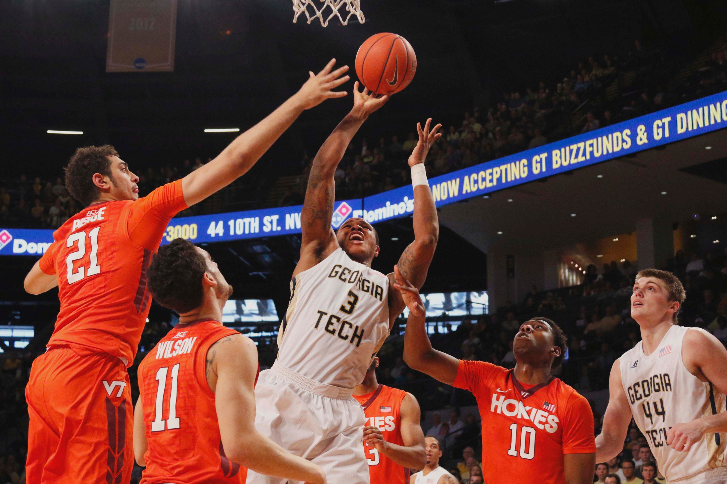 Marcus Georges-Hunt shoots the ball over Virginia Tech Hokies forward Satchel Pierce. Brett Davis-USA TODAY Sports