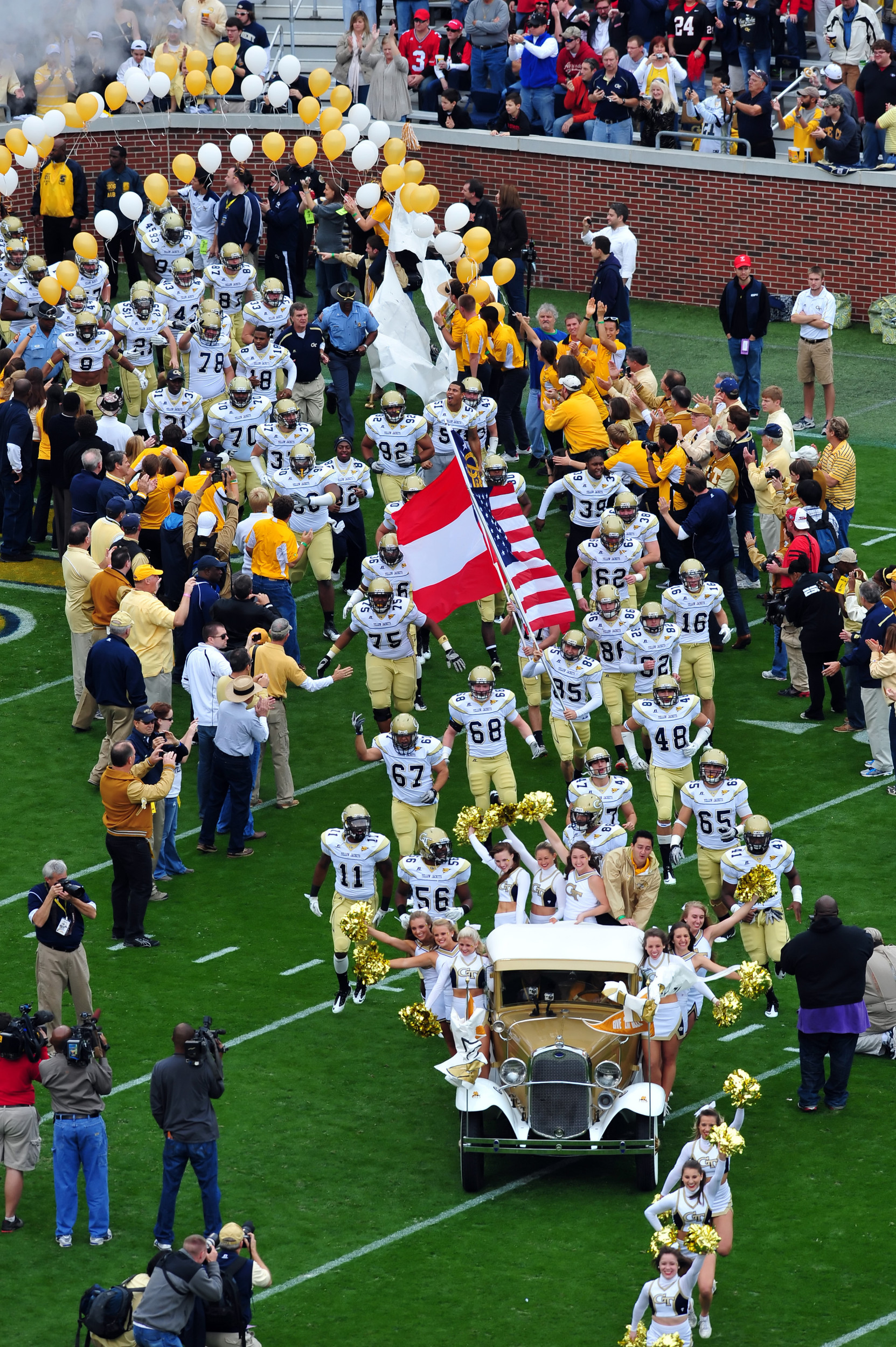 The Ramblin Wreck leads the Yellow Jacket team onto the field.Georgia Tech vs GeorgiaAtlanta, GANovember 26, 2011Photos by David Johnson/LensEffects