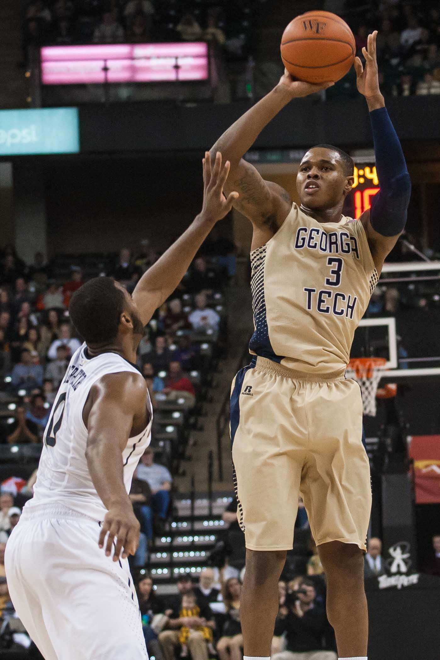 Georgia Tech Yellow Jackets forward Marcus Georges-Hunt (3) shoots the ball over Wake Forest Demon Deacons guard Codi Miller-McIntyre (0) during the second half at Lawrence Joel Veterans Memorial Coliseum. Wake Forest defeated Georgia Tech 76-69. Mandatory Credit: Jeremy Brevard-USA TODAY Sports