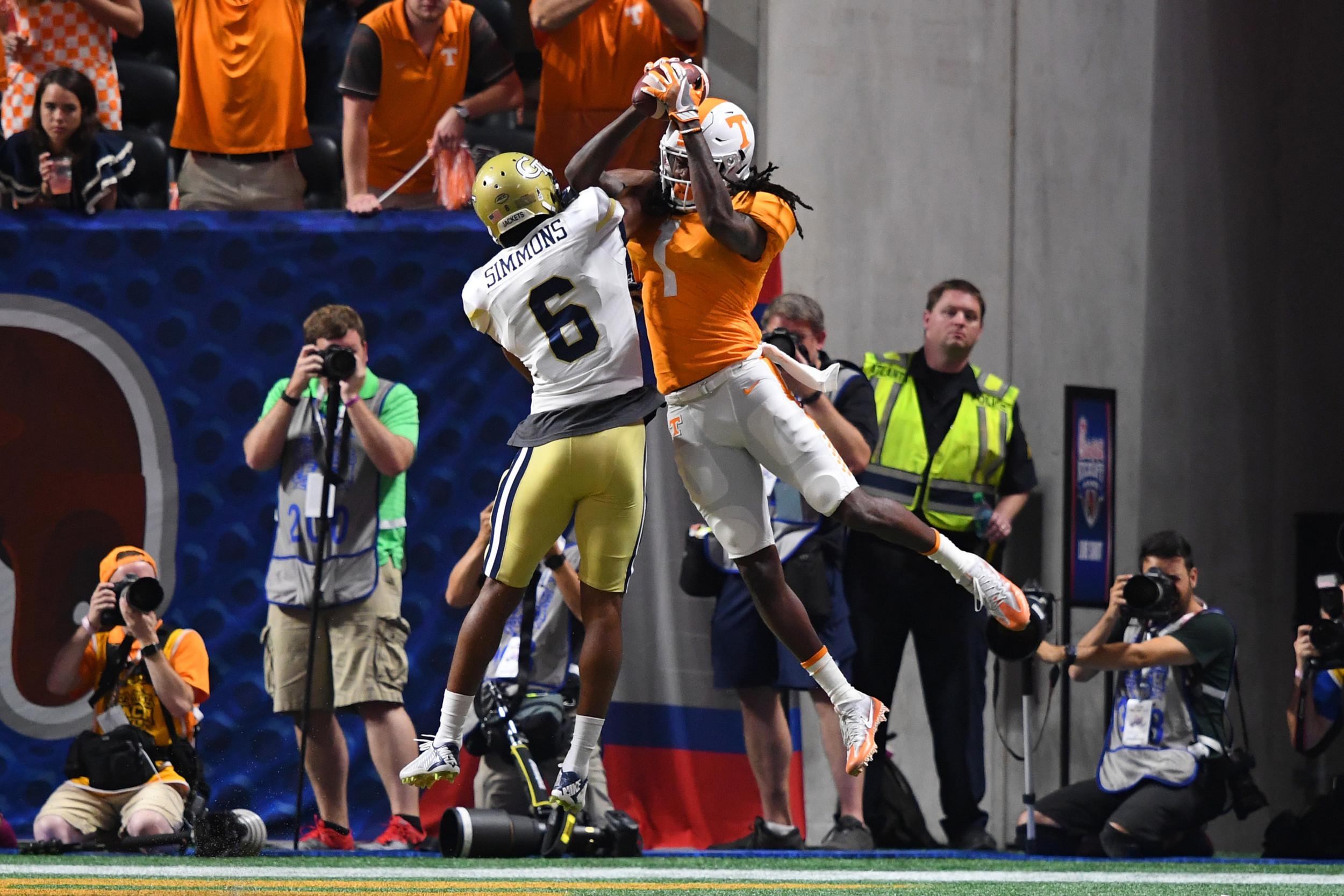 Sep 4, 2017; Atlanta, GA, USA; Tennessee Volunteers wide receiver Marquez Callaway (1) catches a pass for a touchdown against Georgia Tech Yellow Jackets defensive back Lamont Simmons (6) during the third quarter at Mercedes-Benz Stadium. Mandatory Credit: John David Mercer-USA TODAY Sports