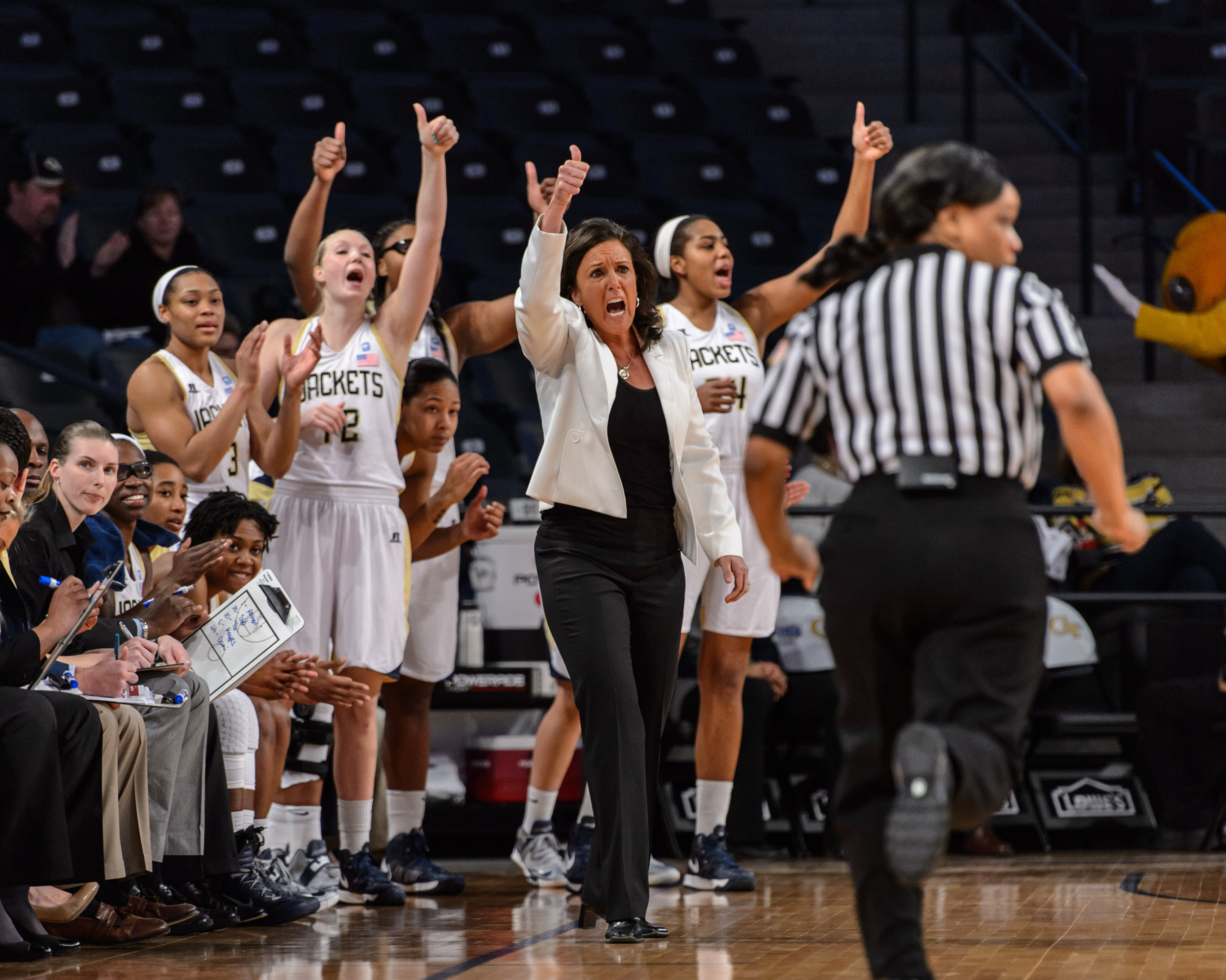 The Georgia Tech bench reacts to a play.
