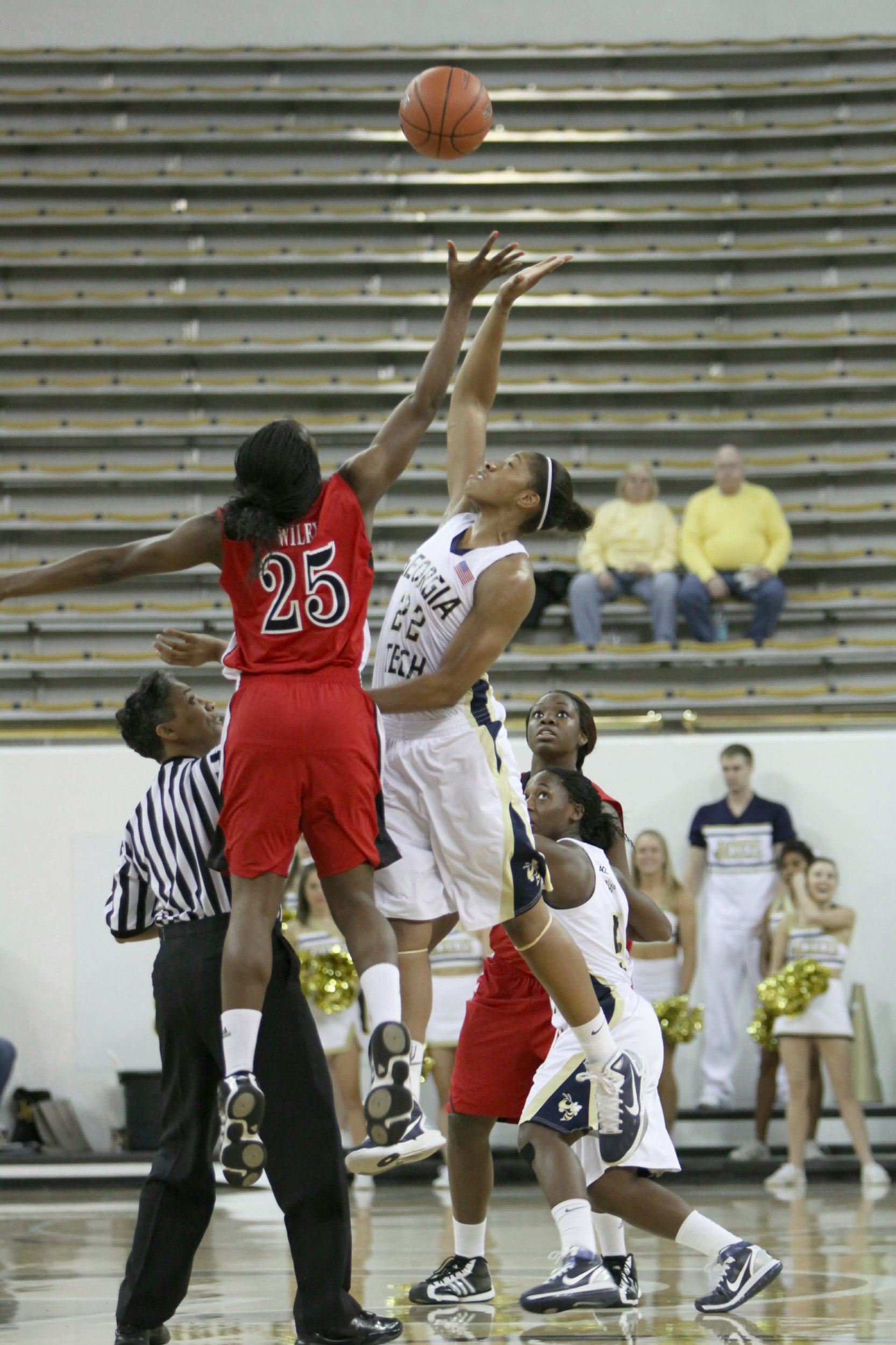 Alex Montgomery takes the opening tip for the Yellow Jackets