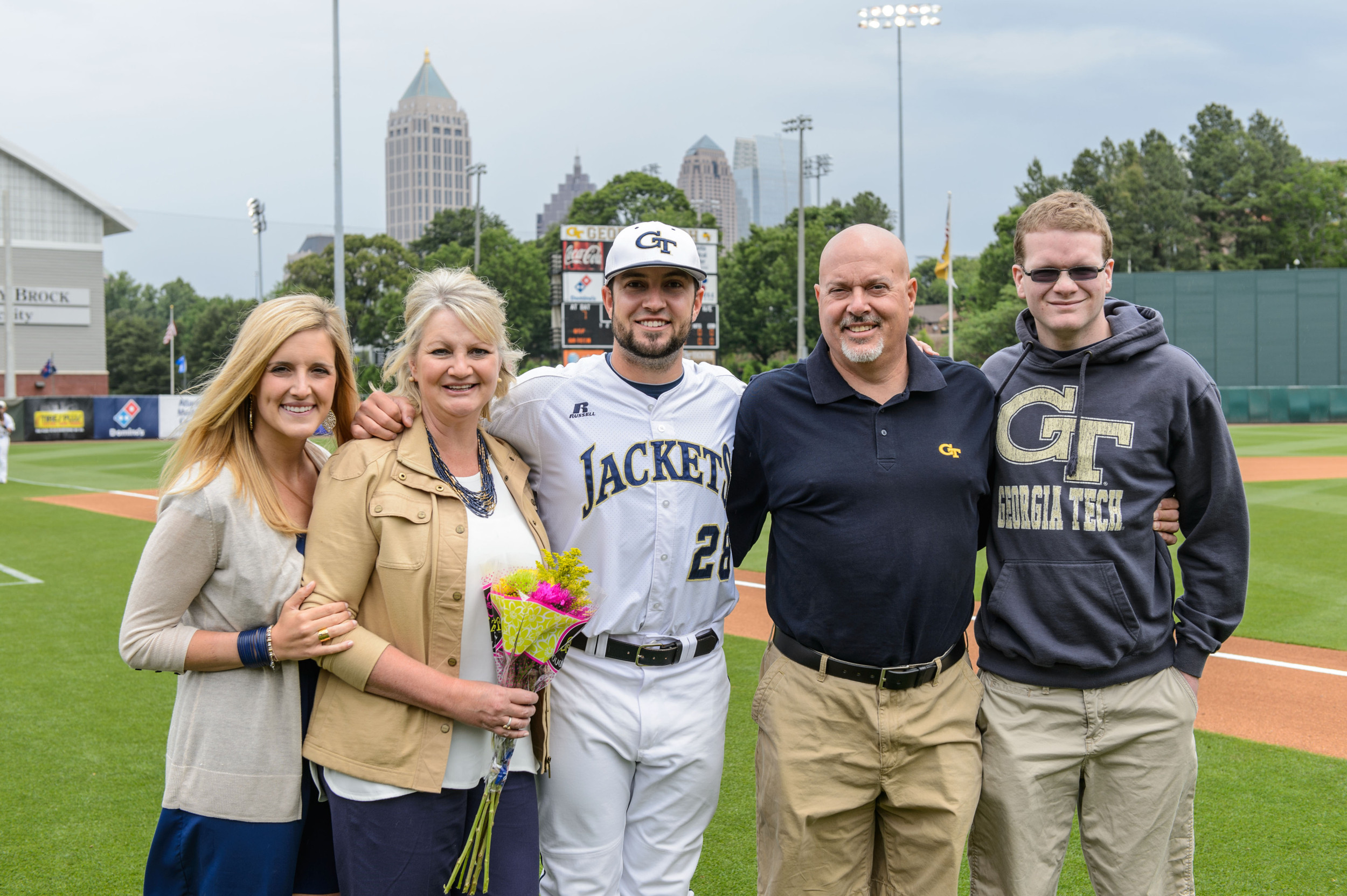 Dusty Isaacs (28) and family