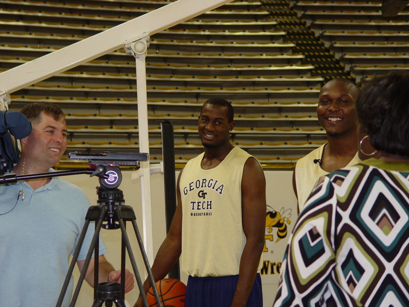 Zachery Peacock and D'Andre Bell get instructions from the Fox 5 photographer and producer.