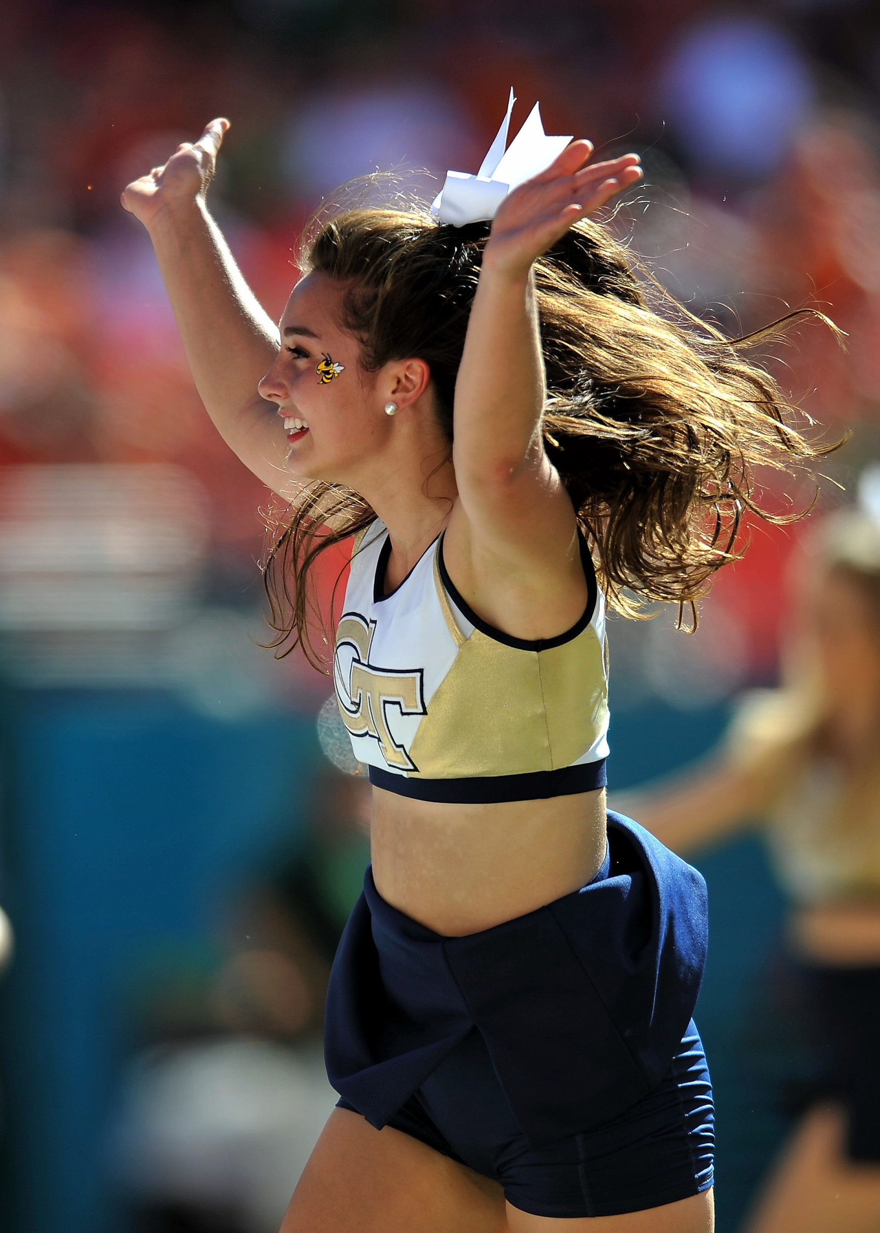 Oct 5, 2013; Miami Gardens, FL, USA; Georgia Tech Yellow Jackets cheerleader performs during the first quarter against the Miami Hurricanes at Sun Life Stadium. Mandatory Credit: Steve Mitchell-USA TODAY Sports