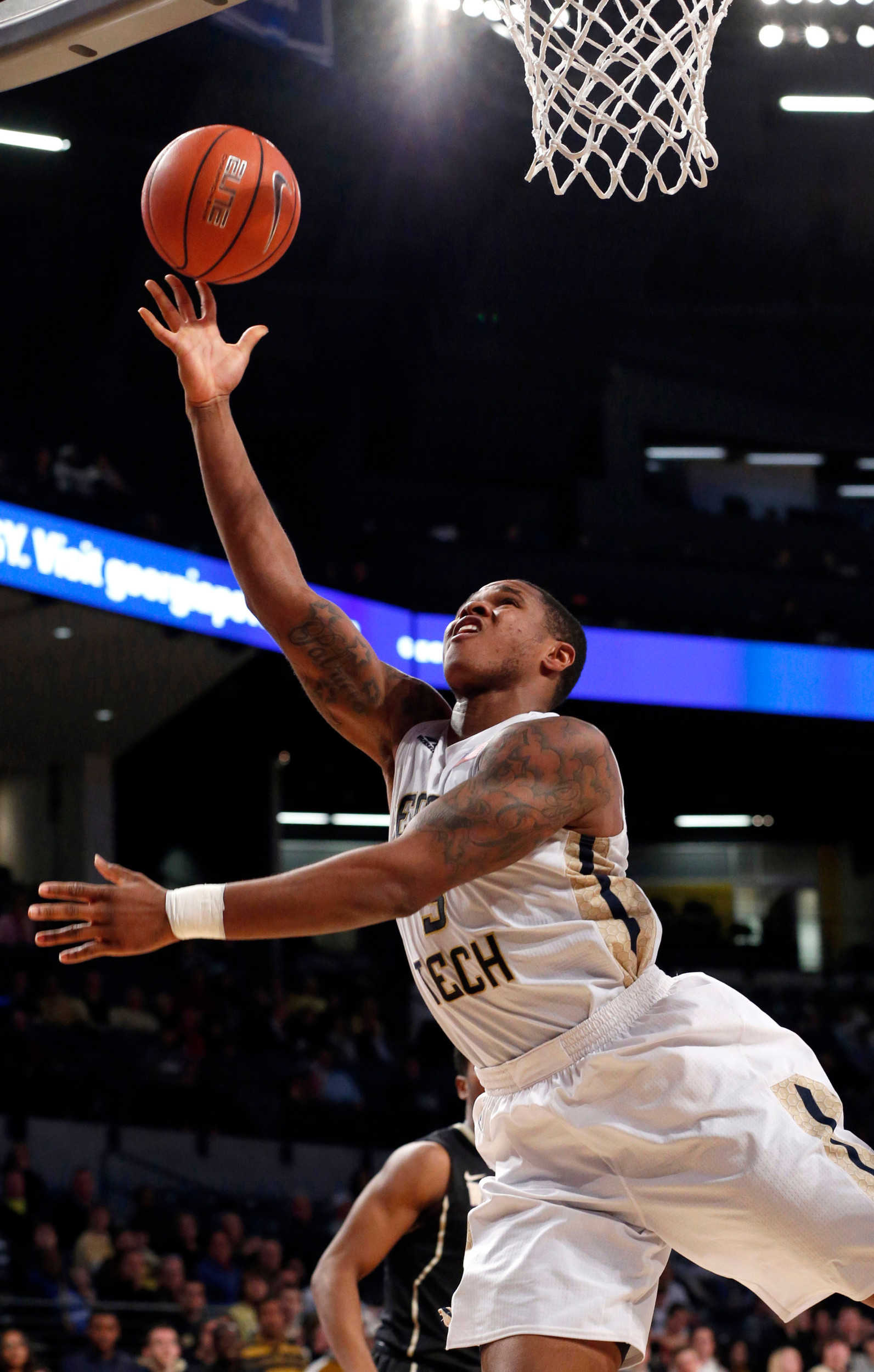 Feb 10, 2016; Atlanta, GA, USA; Georgia Tech Yellow Jackets guard Marcus Georges-Hunt (3) attempts a shot after he was fouled. Credit: Jason Getz-USA TODAY Sports