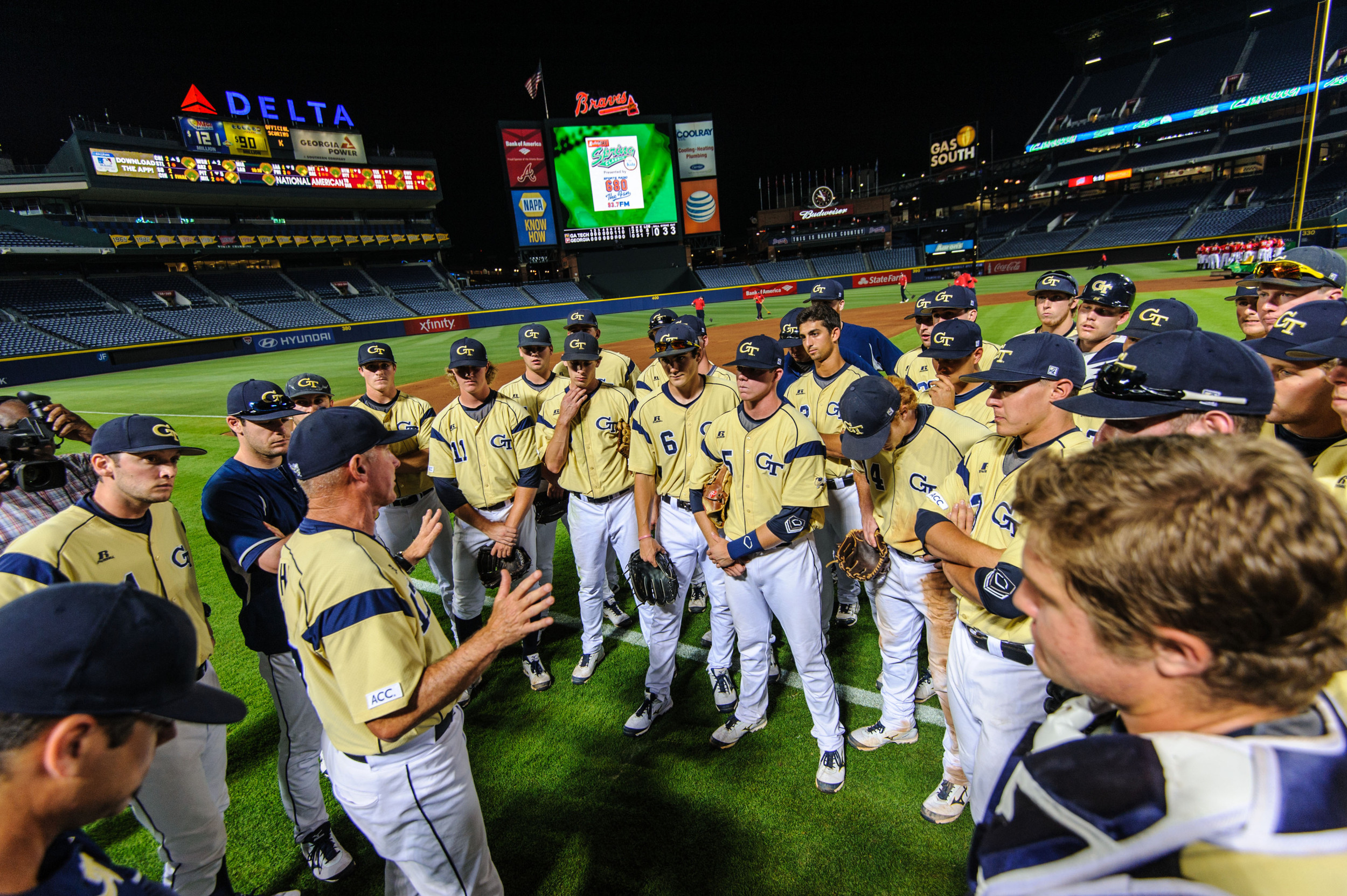 Coach Danny Hall (17) speaks to the team after the series win over UGA.