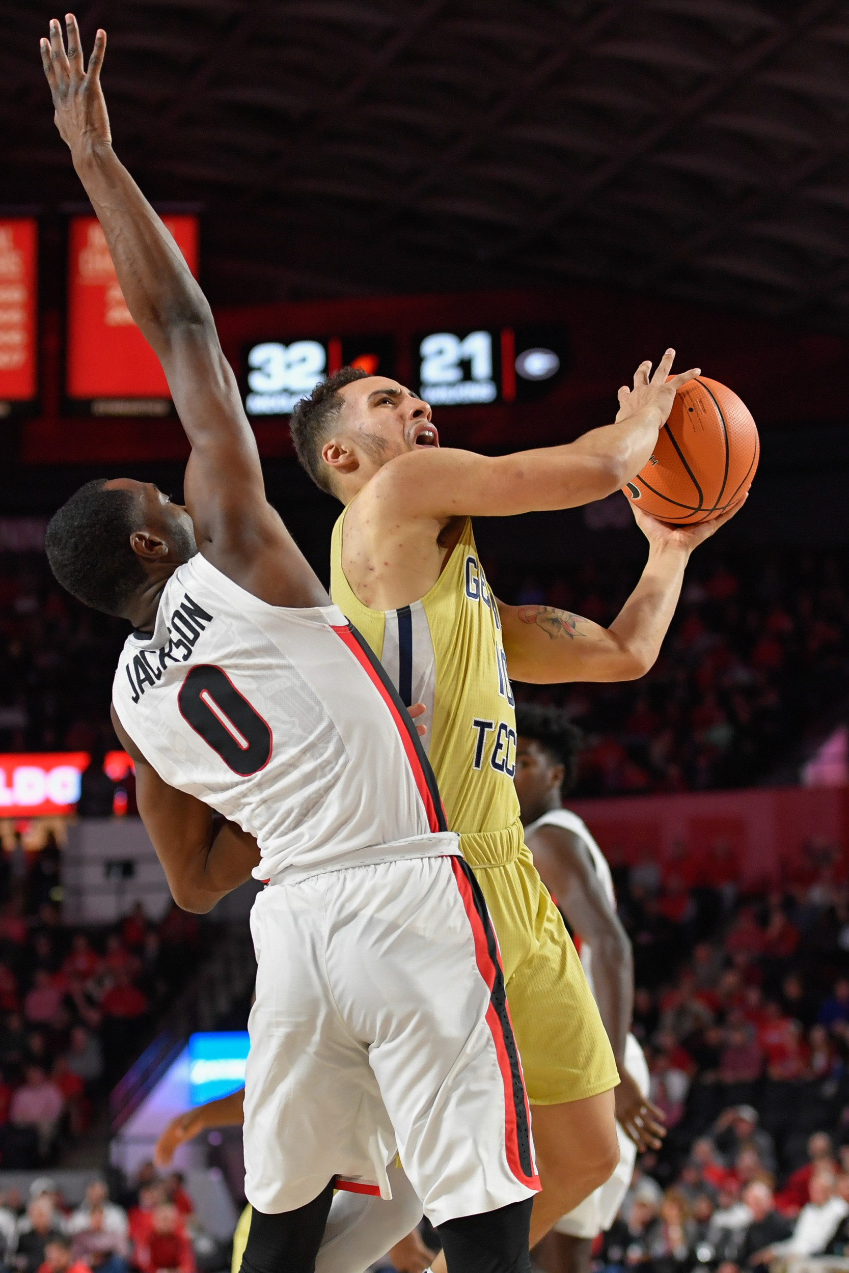 Dec 19, 2017; Athens, GA, USA; Georgia Tech Yellow Jackets guard Jose Alvarado (10) moves to the basket against Georgia Bulldogs guard William Jackson II (0) during the first half at Stegeman Coliseum. Mandatory Credit: Dale Zanine-USA TODAY Sports