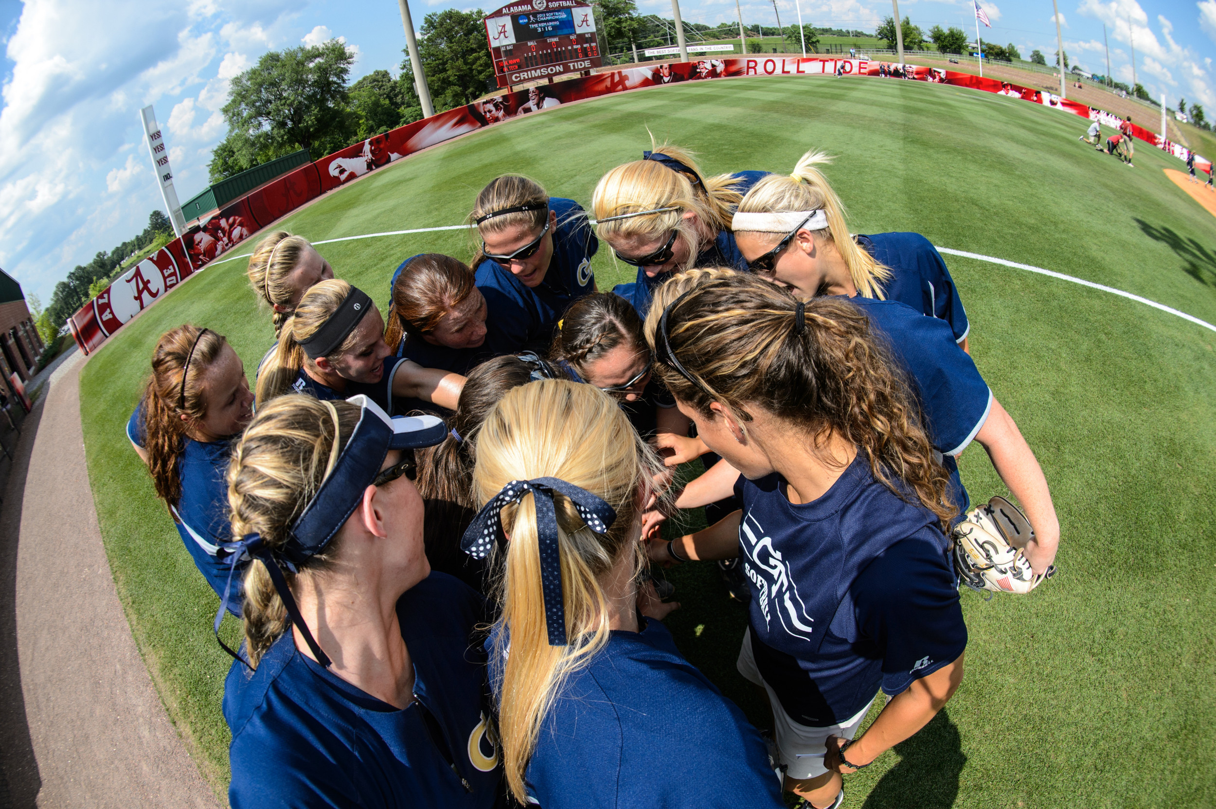 The team huddles after lineups are announced.
