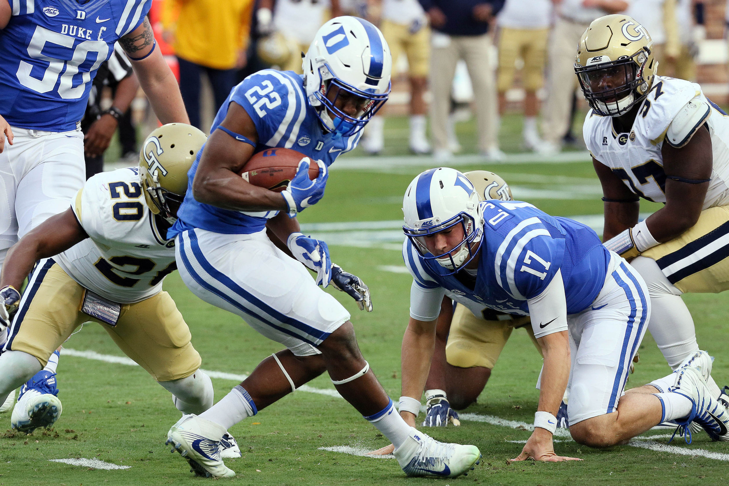 Nov 18, 2017; Durham, NC, USA; Duke Blue Devils running back Brittain Brown (22) advances the ball after recovering a fumble in the first half at Wallace Wade Stadium. Mandatory Credit: Mark Dolejs-USA TODAY Sports