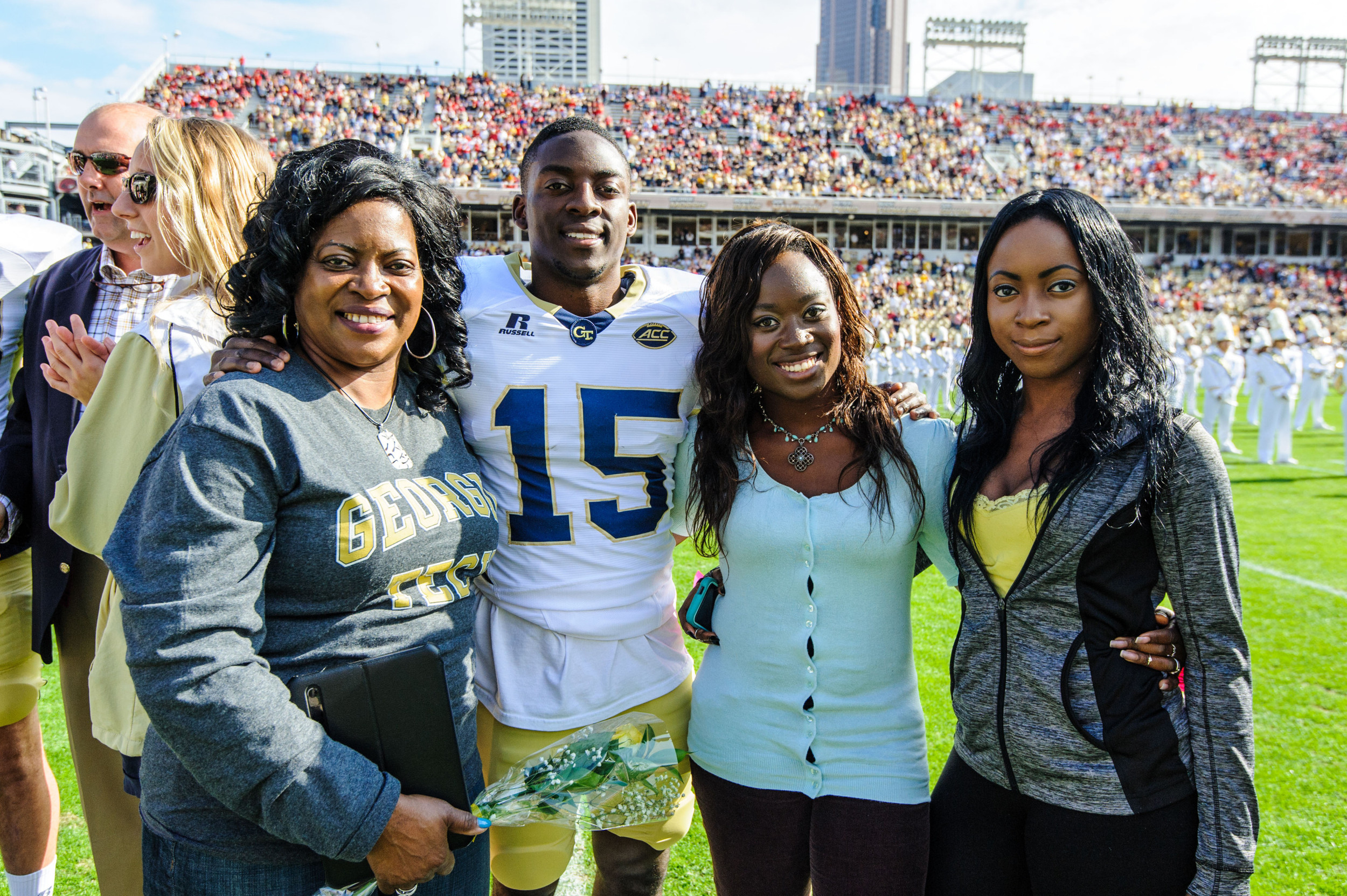 Denis Onwualu (15) and family