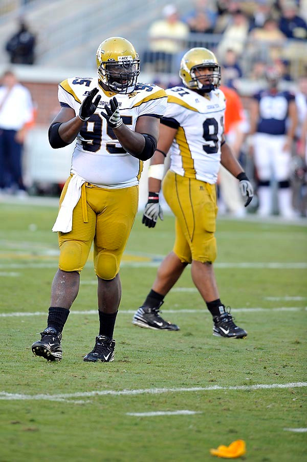 Darryl Richard (95) appluads after Virginia was penalized for holding. (Photo by LensEffects)