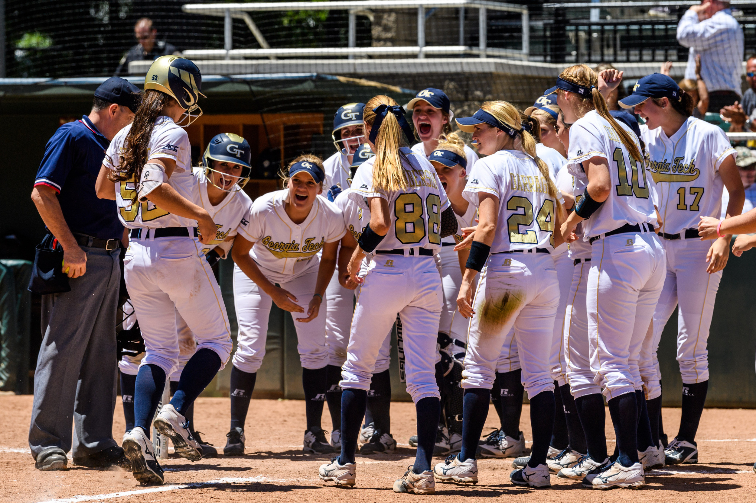 The team welcomes Samantha Pierannunzi (52) to the plate after her home run