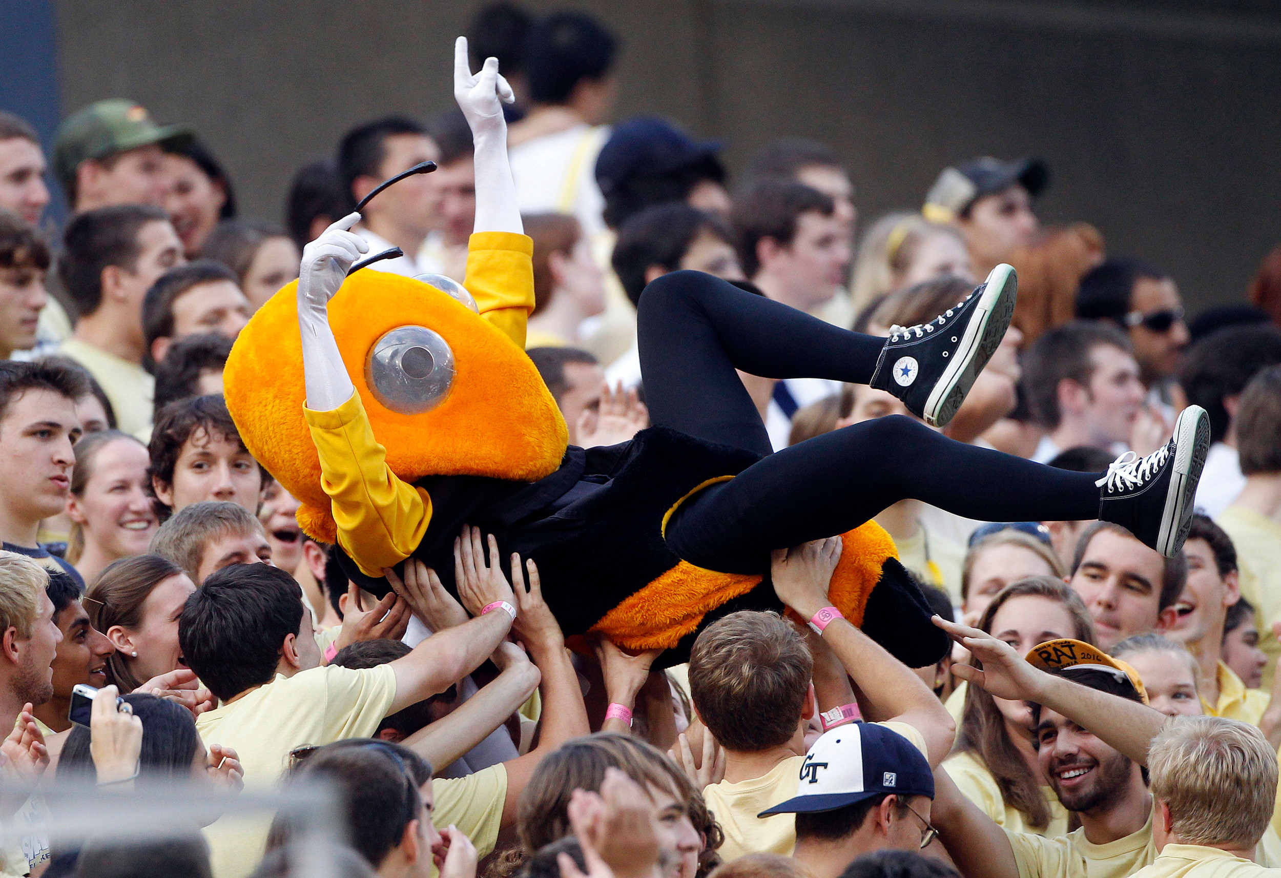 Georgia Tech mascot Buzz crowd surfs before the game. (AP Photo/John Bazemore)