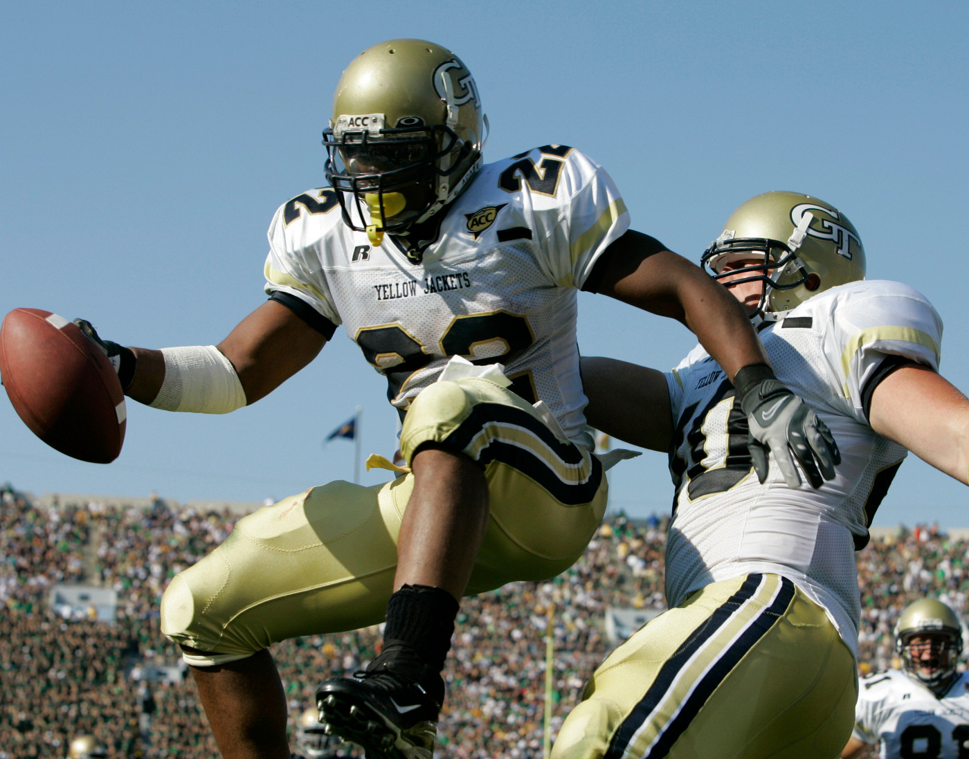 Georgia Tech running back Tashard Choice, left, and fullback Mike Cox celebrate after Choice scored a touchdown on a 22-yard run against Notre Dame in the second quarter of a football game in South Bend, Ind., Saturday, Sept. 1, 2007.
