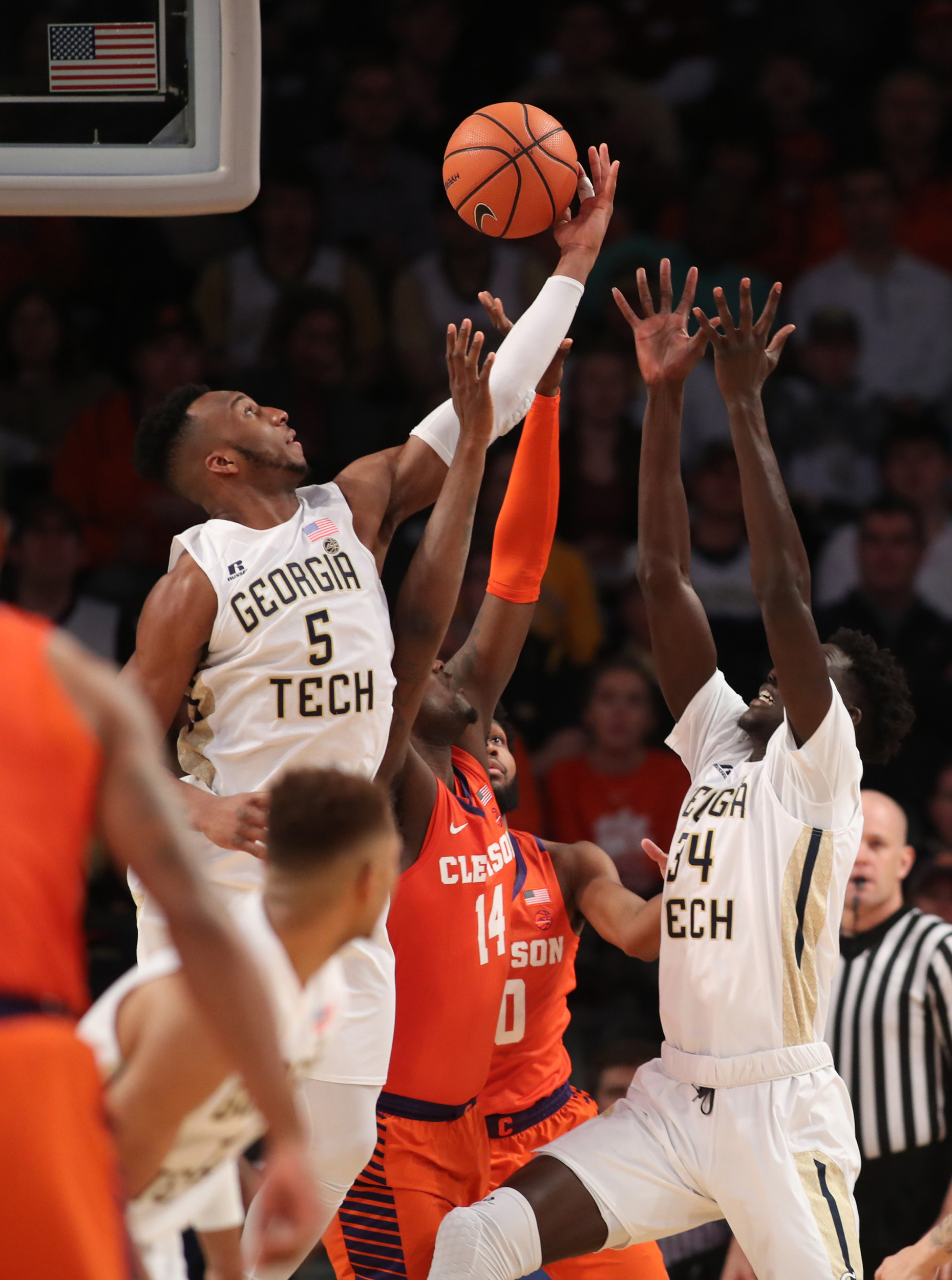 Jan 28, 2018; Atlanta, GA, USA; Georgia Tech Yellow Jackets guard Josh Okogie (5) grabs a rebound against Clemson Tigers forward Elijah Thomas (14) during the first half at McCamish Pavilion. Mandatory Credit: Jason Getz-USA TODAY Sports