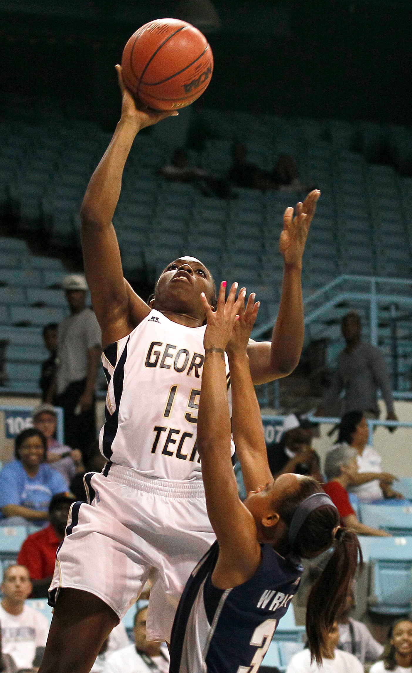 Georgia Tech's Tyaunna Marshall shoots as Georgetown's Rubylee Wright defends. (AP Photo/Gerry Broome)