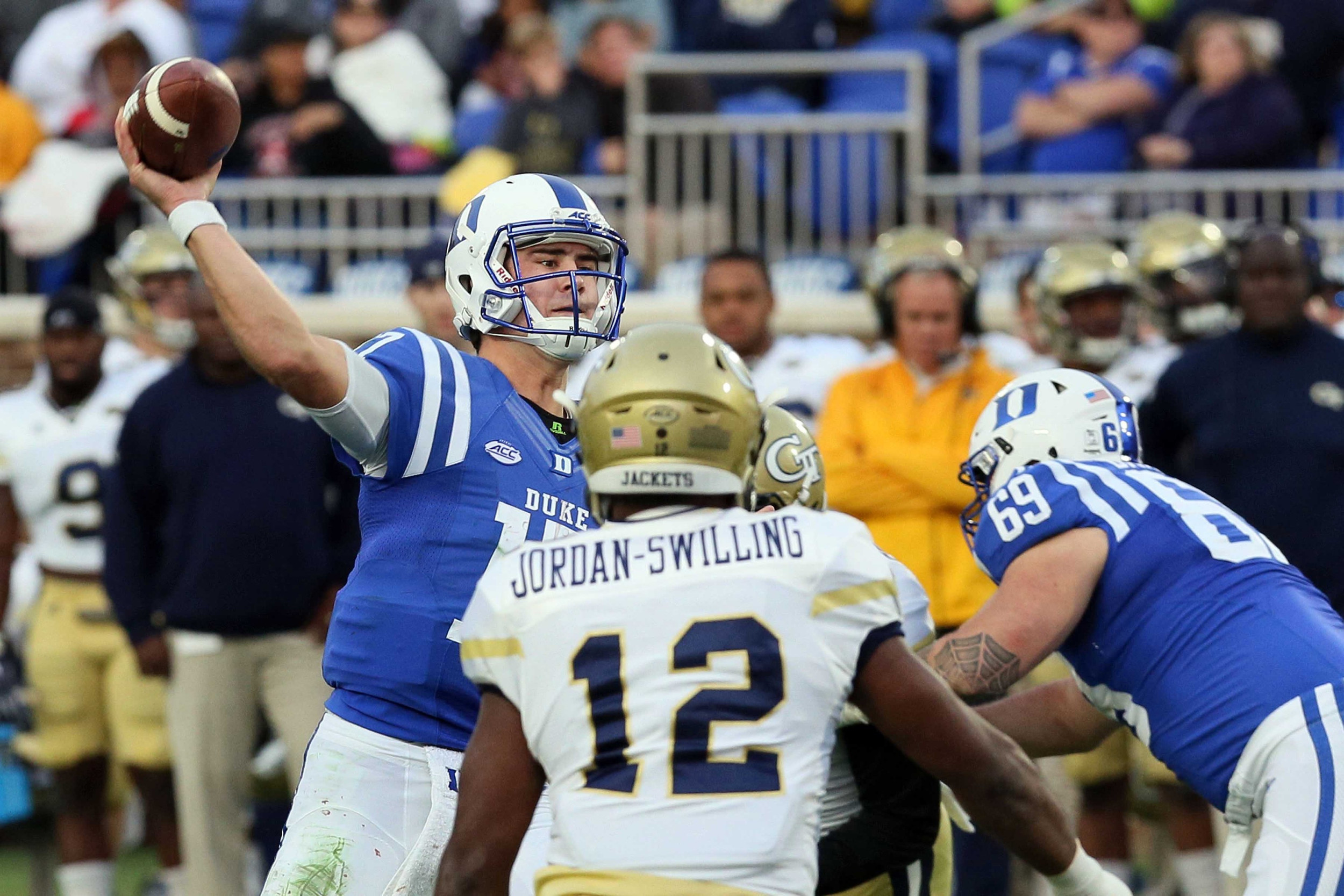 Nov 18, 2017; Durham, NC, USA; Duke Blue Devils quarterback Daniel Jones (17) throws to a receiver against the Georgia Tech Yellow Jackets defense in the first half at Wallace Wade Stadium. Mandatory Credit: Mark Dolejs-USA TODAY Sports