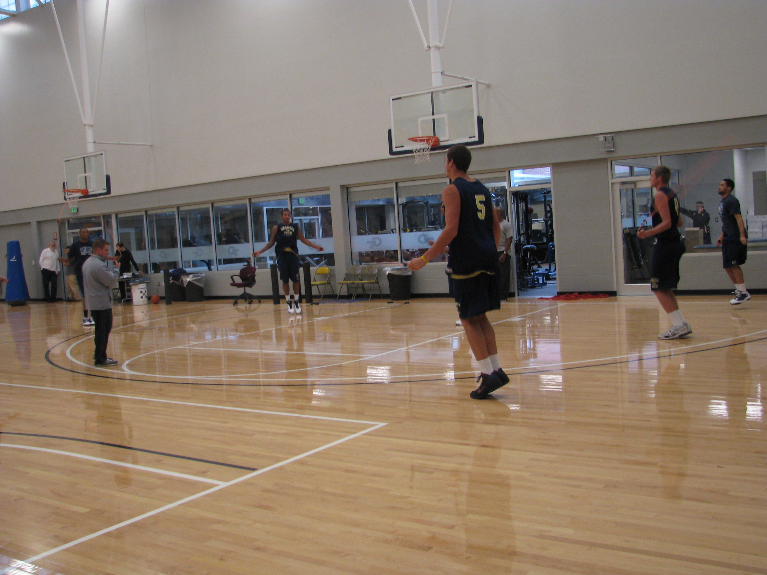 Head coach Brian Gregory puts the Yellow Jackets through individual workouts.