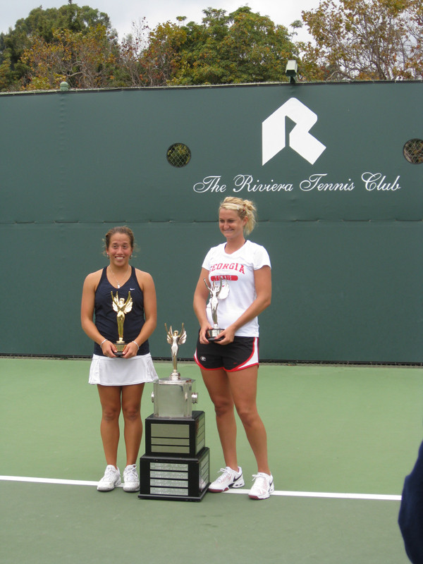 Irina Falconi holds her championship trophy next to runner-up Chelsey Gullickson of Georgia