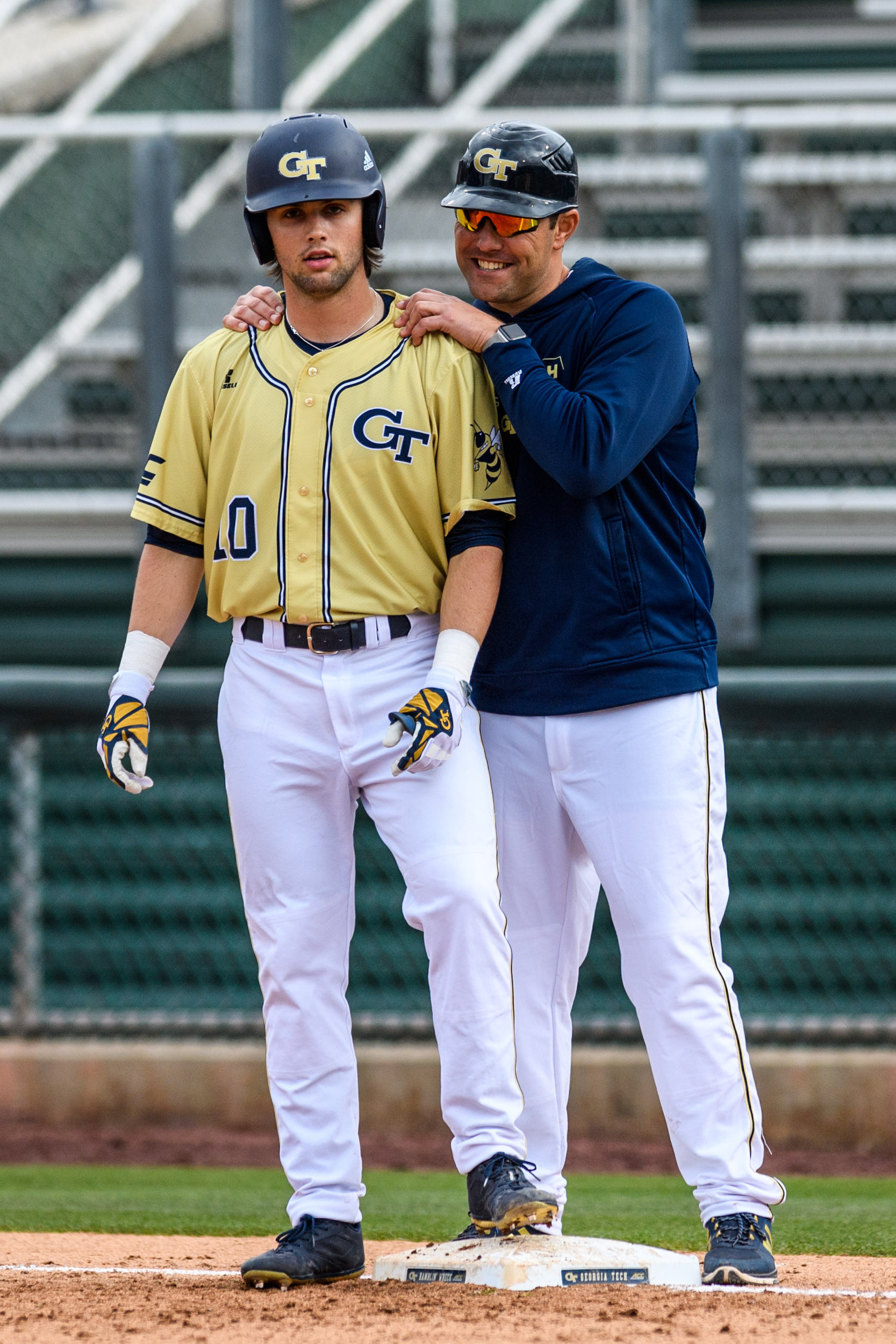 Chase Murray (10), Volunteer Assistant Coach Mike Nickeas (12)
