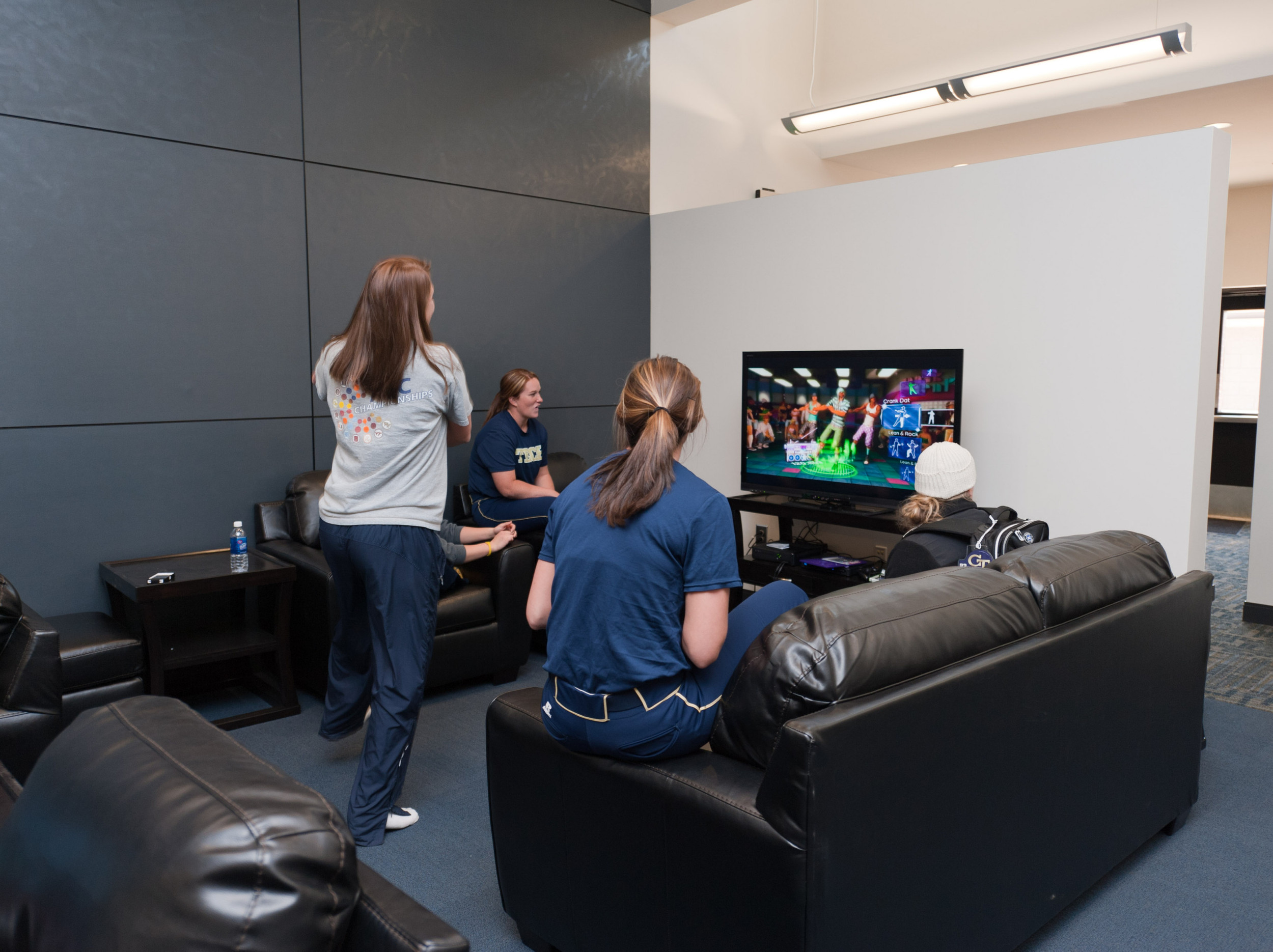 In the players lounge, there are couches, chairs, two satellite televisions and a video game system for the players' use.