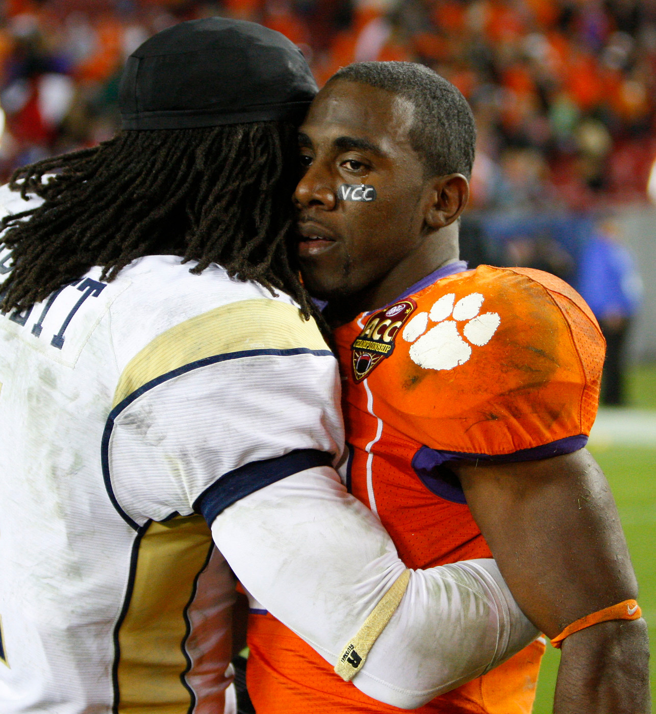 Georgia Tech safety Morgan Burnett consoles Clemson running back C.J. Spiller.