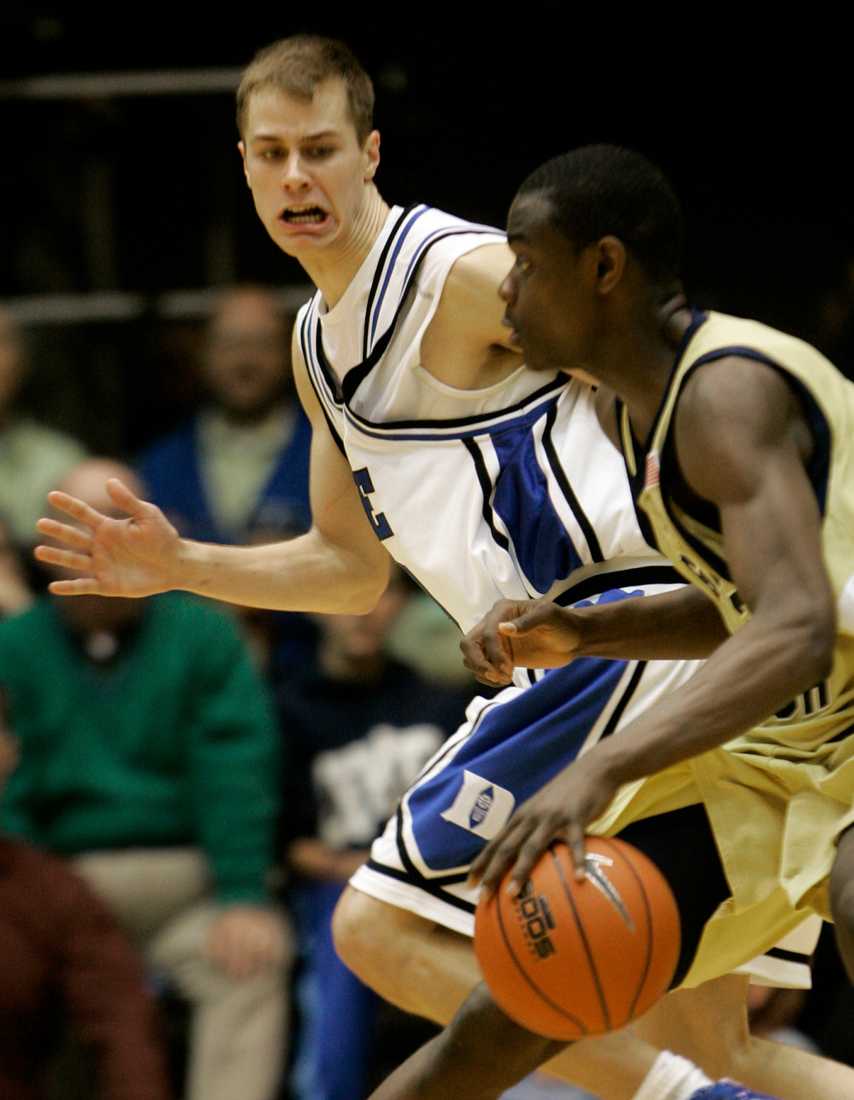 Duke's Jon Scheyer, left, guards Georgia Tech's Anthony Morrow during the second half of a college basketball game in Durham, N.C., Sunday, Feb. 18, 2007. Duke won 71-62. (AP Photo/Gerry Broome)