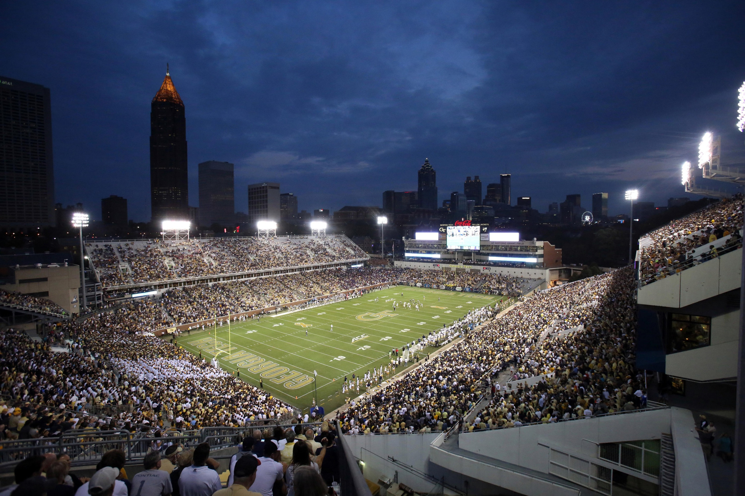 The sun sets over the Atlanta skyline at Bobby Dodd Stadium. Credit: Jason Getz-USA TODAY Sports