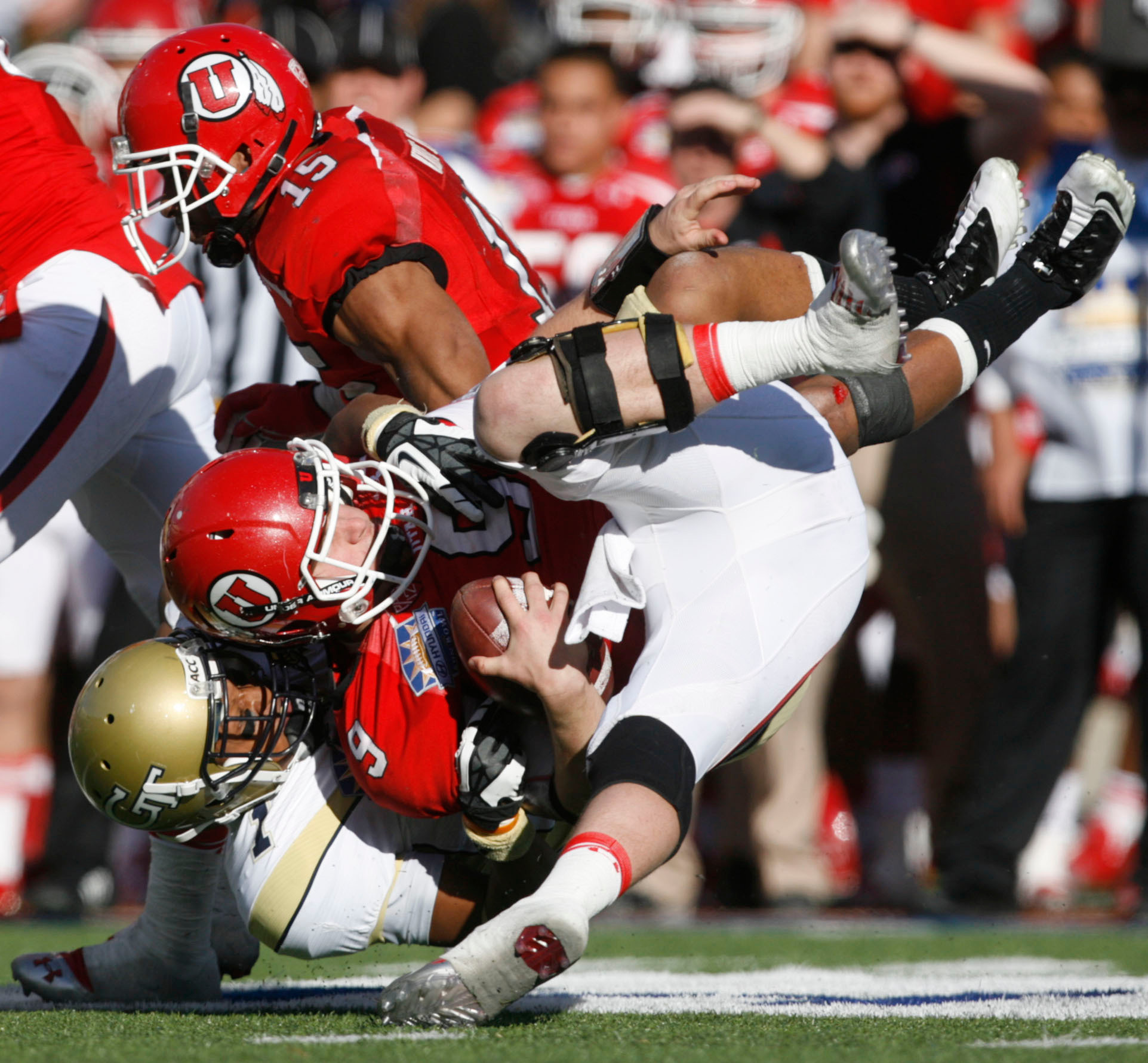 Utah quarterback Jon Hays is sacked by Georgia Tech's Isaiah Johnson during the third quarter in the Sun Bowl NCAA college football game on Saturday, Dec. 31, 2011, in El Paso, Texas. Utah won 30-27 in overtime. (AP Photo/The Salt Lake Tribune, Trent Nelson) DESERET NEWS OUT; LOCAL TV OUT