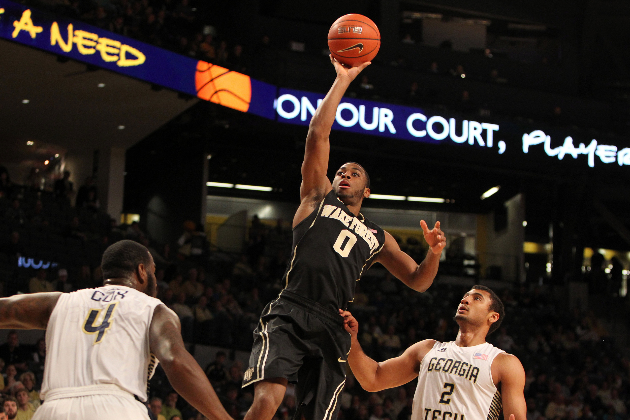 Feb 7, 2015; Atlanta, GA, USA; Wake Forest Demon Deacons guard Codi Miller-McIntyre (0) shoots the ball against the Georgia Tech Yellow Jackets in the first half at McCamish Pavilion. Mandatory Credit: Brett Davis-USA TODAY Sports