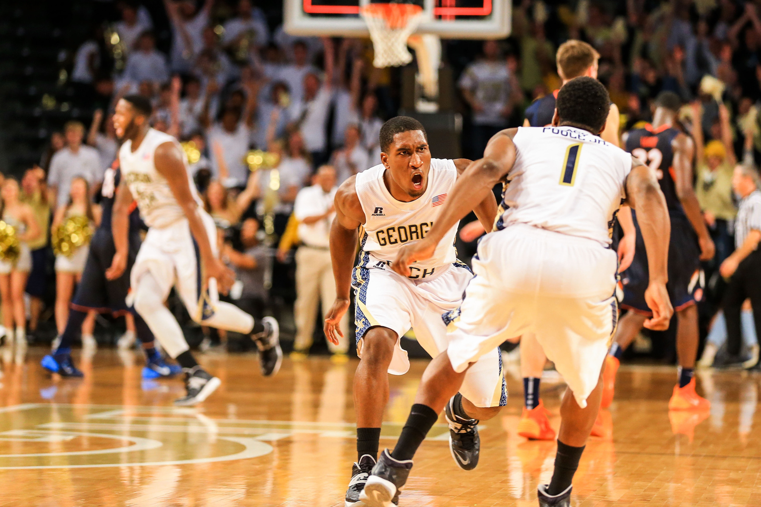Solomon Poole (2) celebrates with guard Stacey Poole, Jr. (1). (Daniel Shirey-USA TODAY Sports)