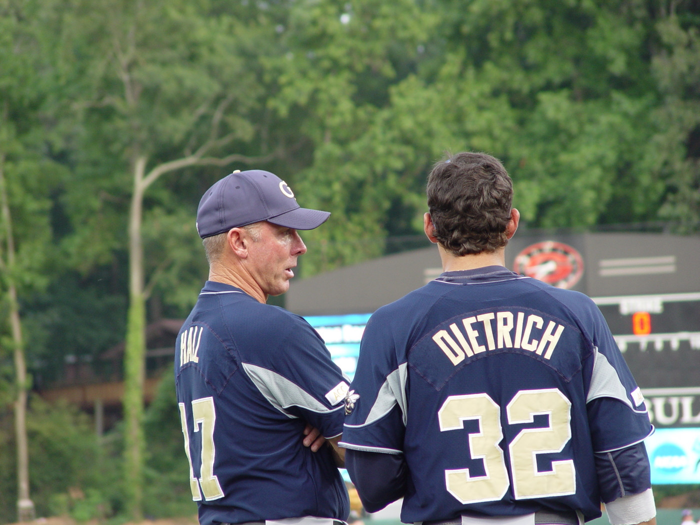 Danny Hall and Derek Dietrich talk strategy during an inning break of Tech's NCAA regional game vs. Lipscomb, May 31, 2008.