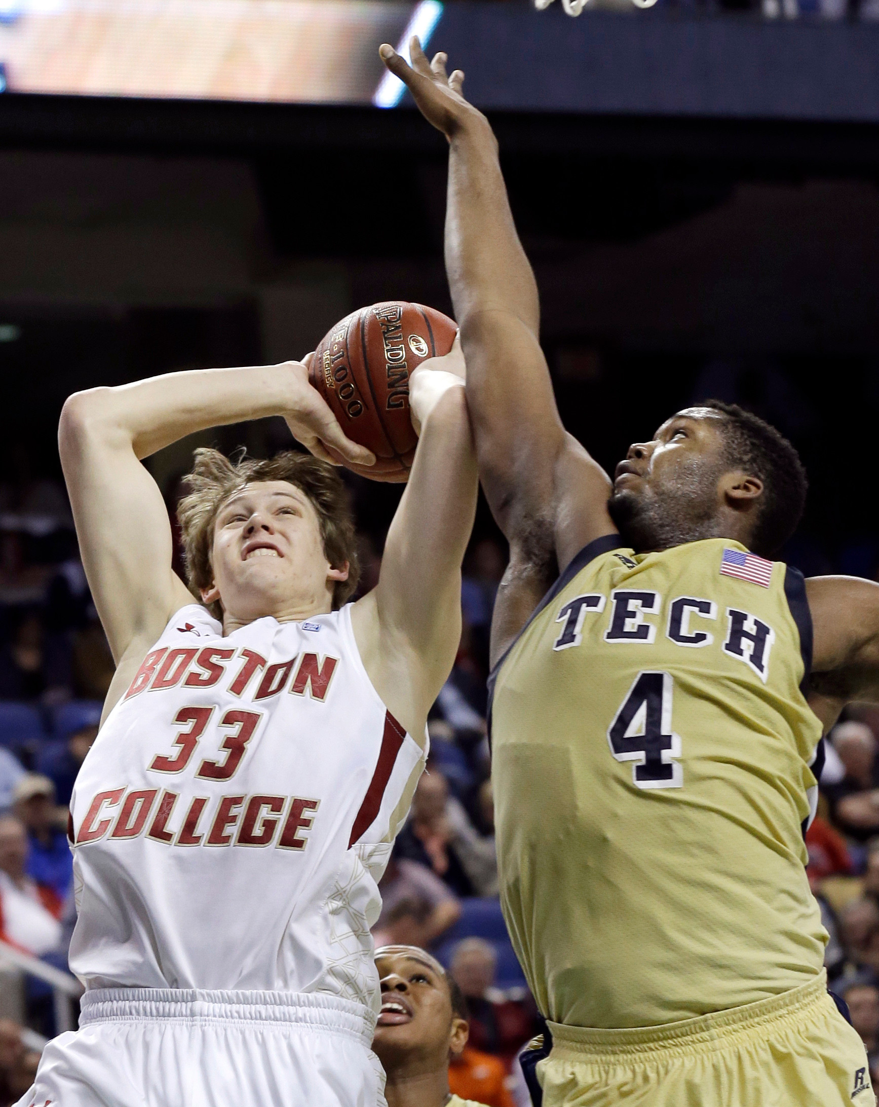 Boston College's Patrick Heckmann (33) shoots over Georgia Tech's Robert Carter (4). (AP Photo/Gerry Broome)