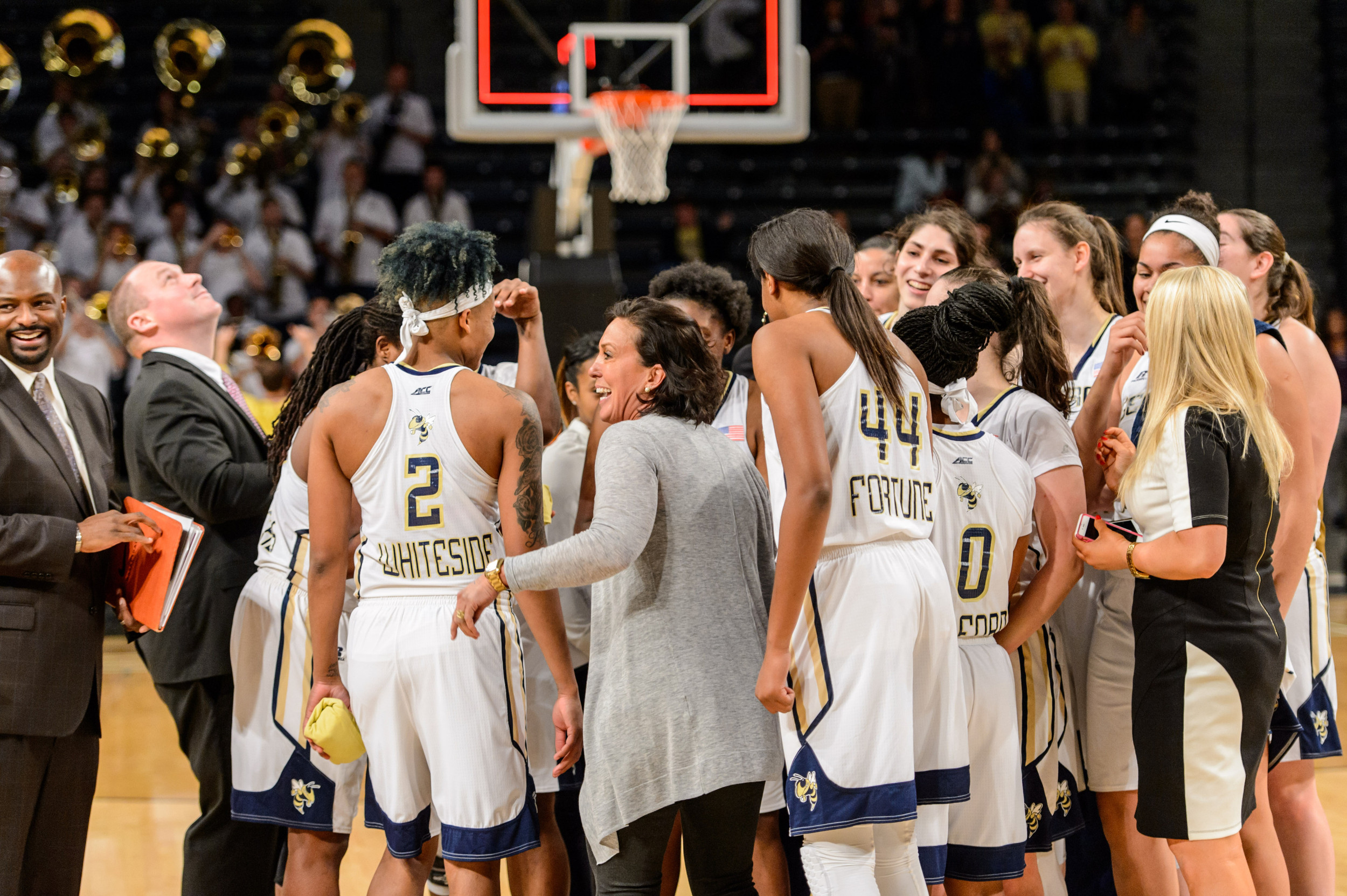 Coach Jo talks to the team after the win
