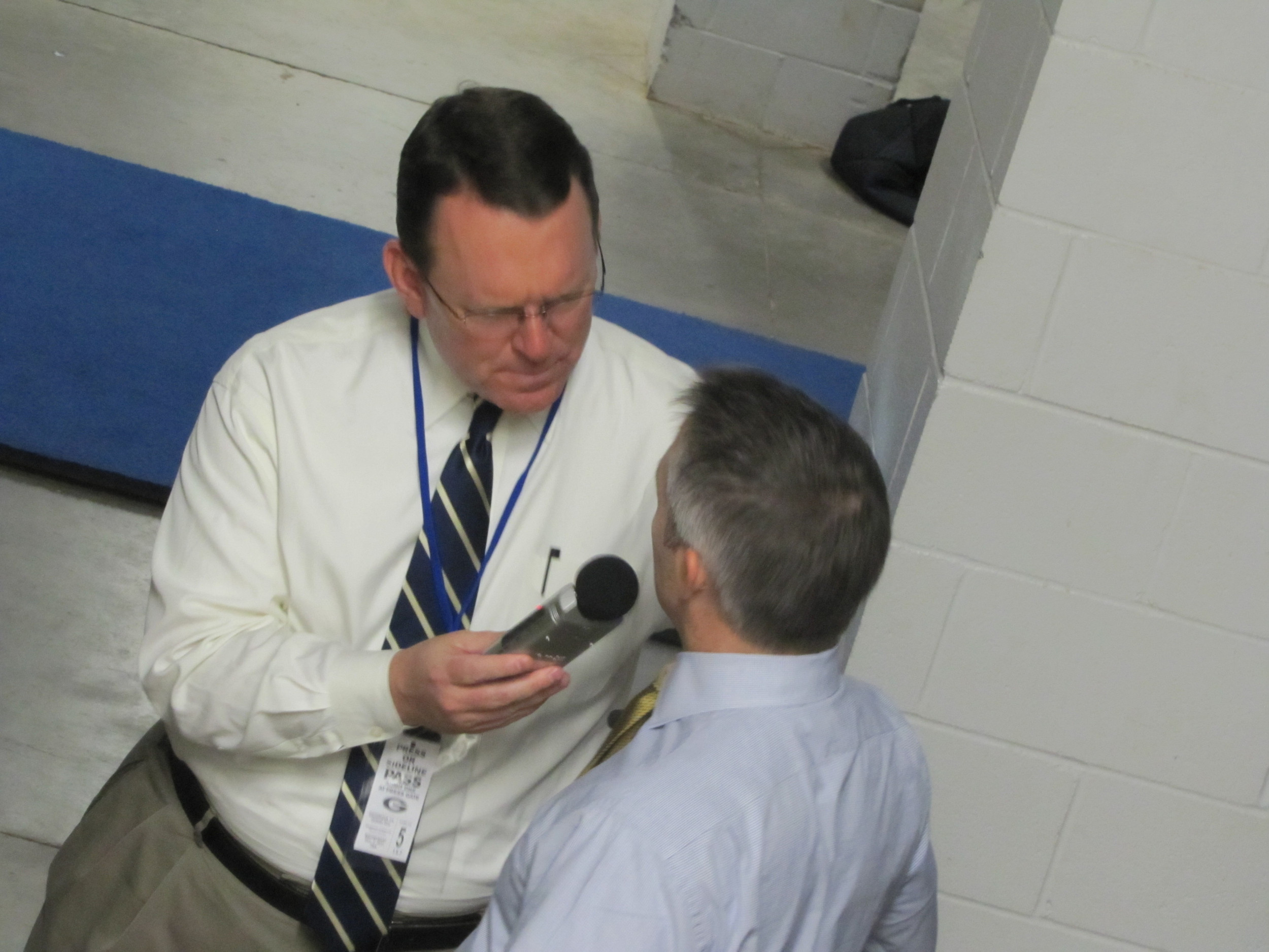 Coach Gregory doing his pre-game radio interview with Wes Durham.