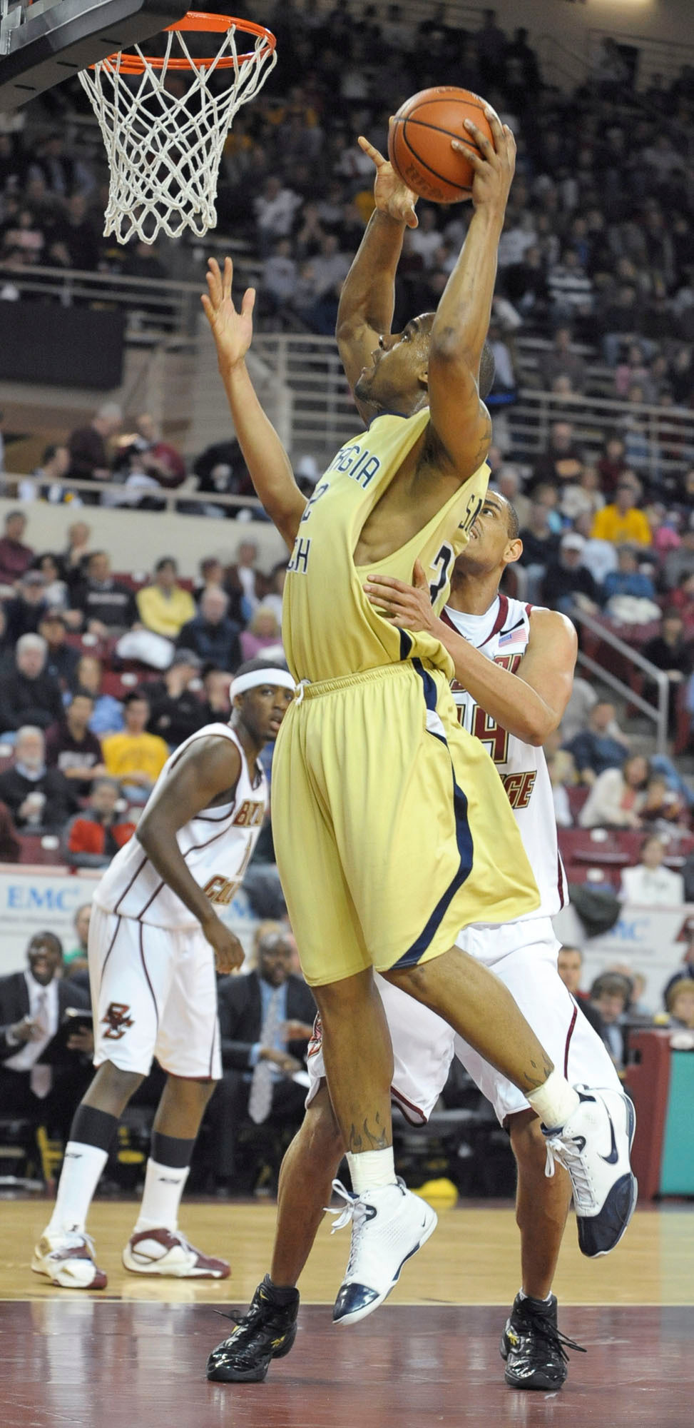 Boston College's Tyrelle Blair tries to hold Jeremis Smith back as he goes up to score during the first half. (AP Photo/Lisa Poole)