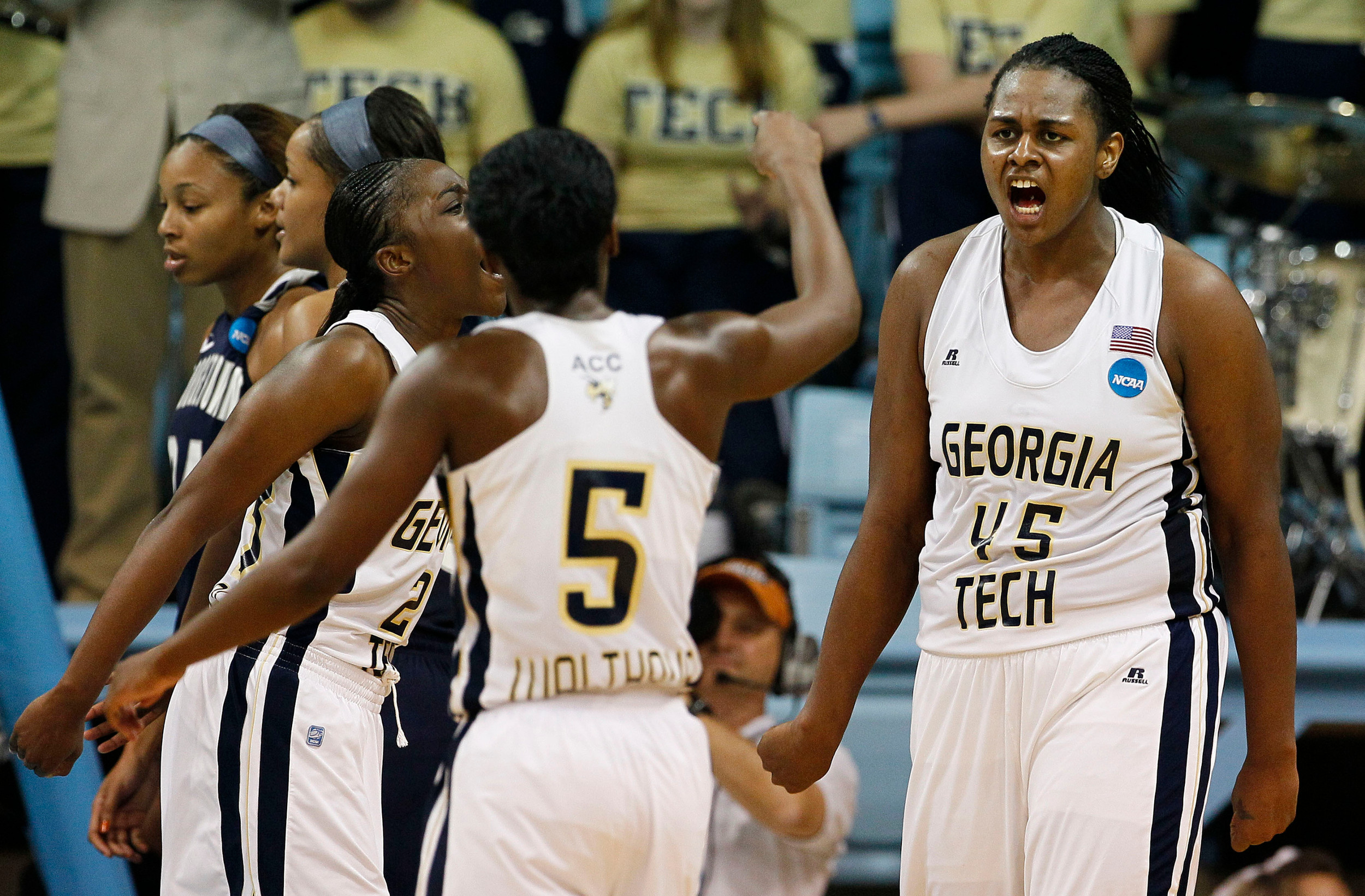 Georgia Tech's Sasha Goodlett (45), Metra Walthour (5) and Sydney Wallace, left, react during the second half. Georgia Tech won 76-64. (AP Photo/Gerry Broome)