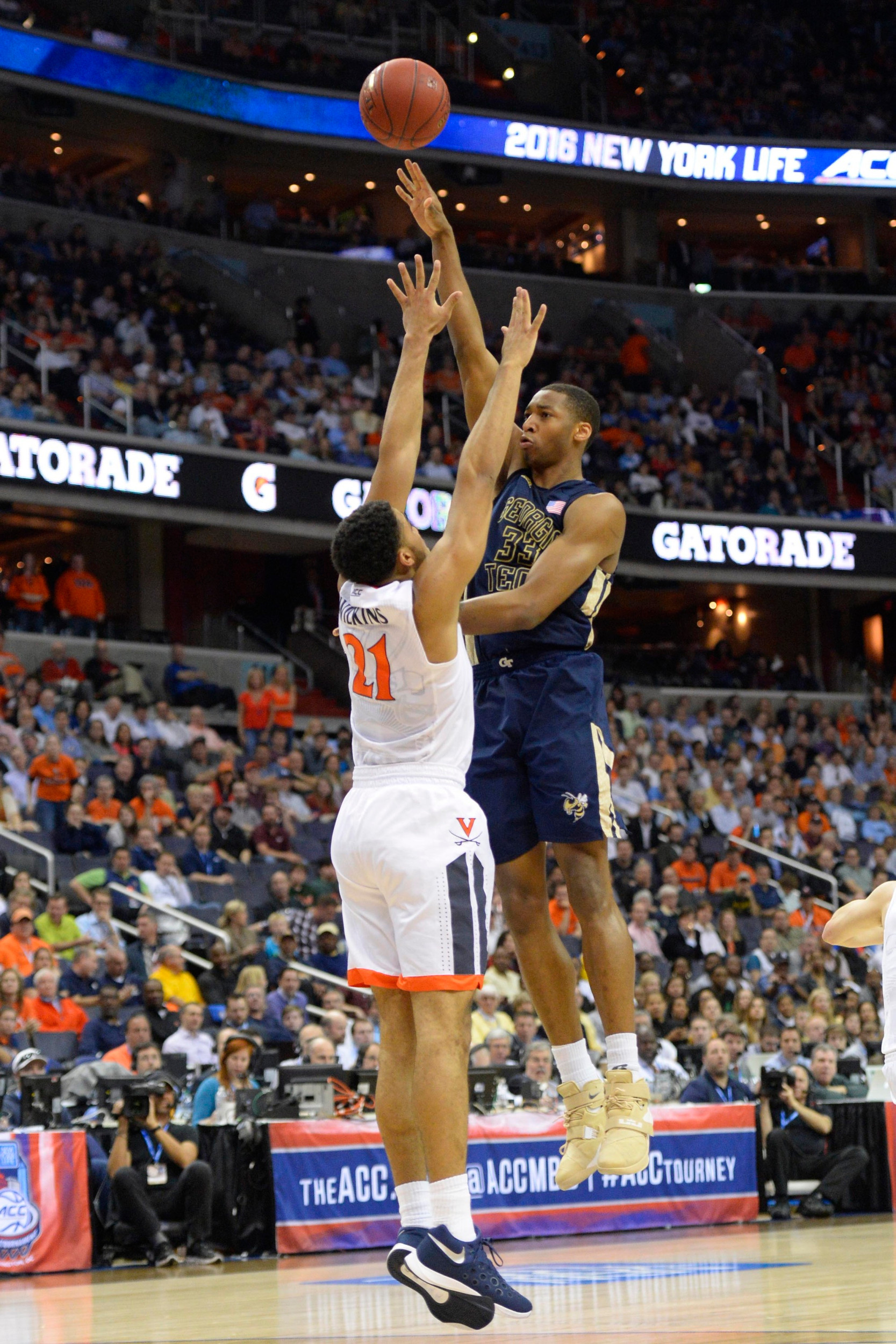 Mar 10, 2016; Washington, DC, USA; Georgia Tech Yellow Jackets forward James White (33) shoots over Virginia Cavaliers forward Isaiah Wilkins (21). Credit: Tommy Gilligan-USA TODAY Sports