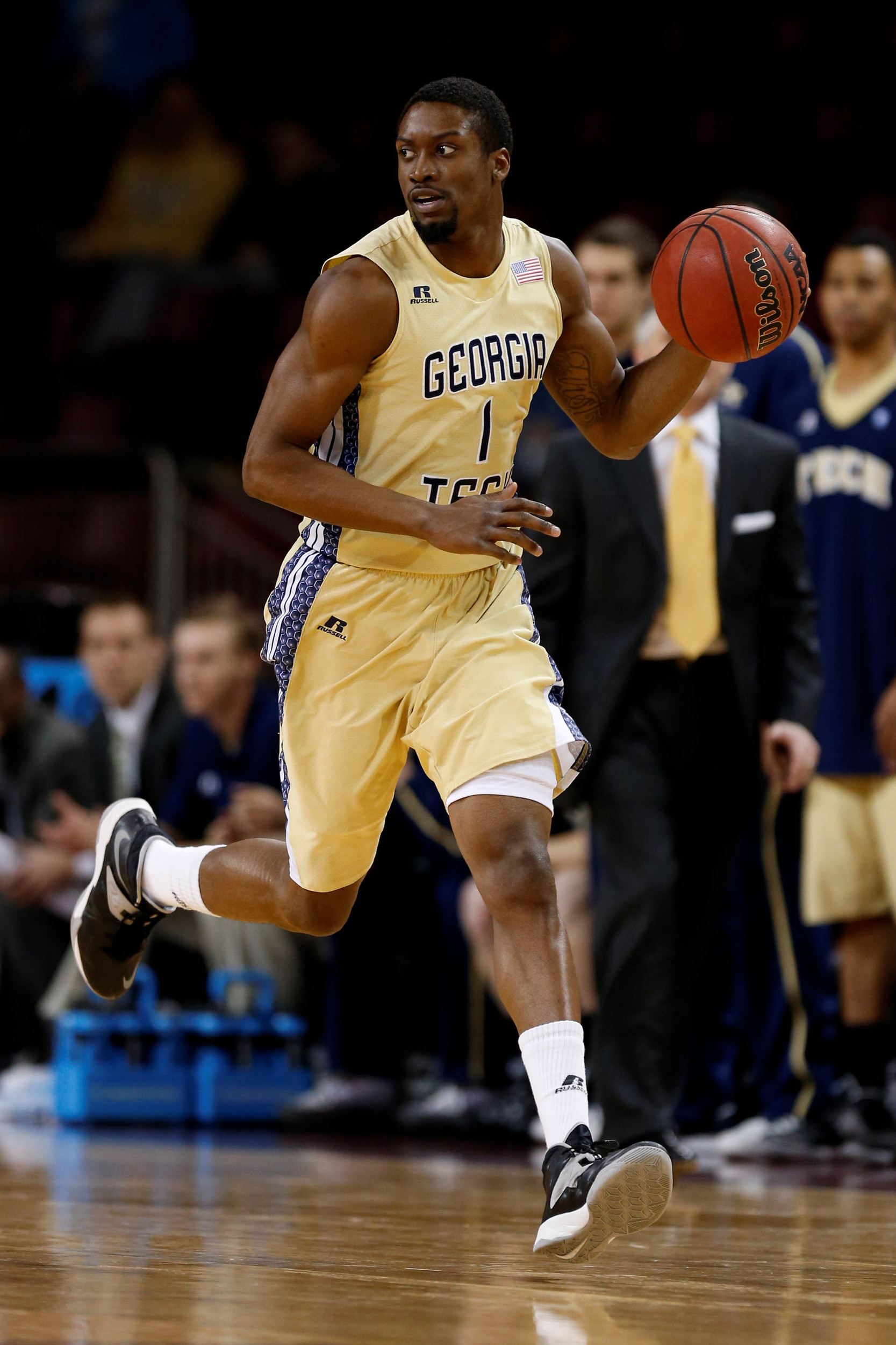 Jan 21, 2014; Chestnut Hill, MA, USA; Georgia Tech Yellow Jackets guard/forward Stacey Poole, Jr. (1) brings the ball up court during the first half against the Boston College Eagles at Silvio O. Conte Forum. Mandatory Credit: Greg M. Cooper-USA TODAY Sports