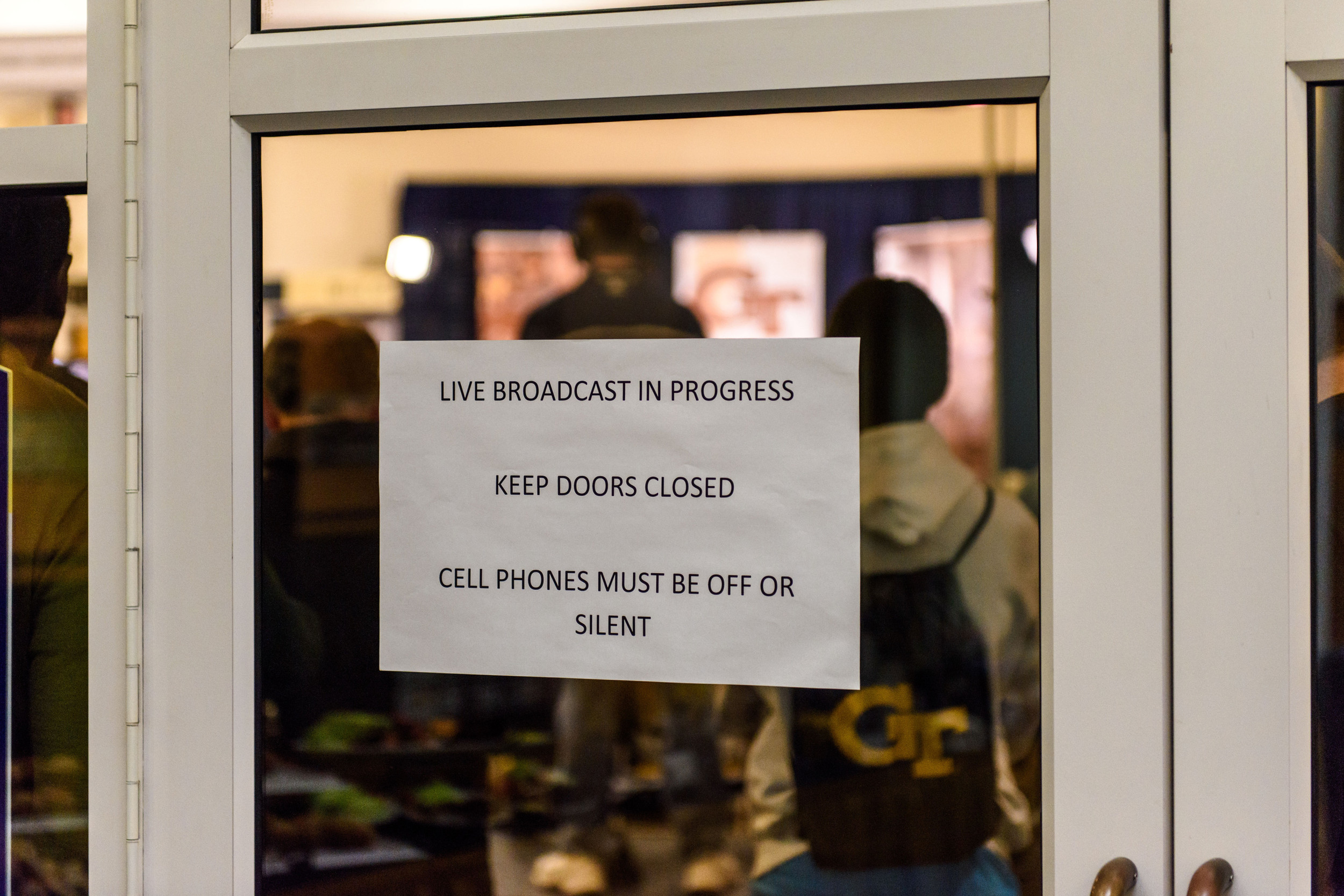 A sign warns fans about the live broadcast on ESPN3