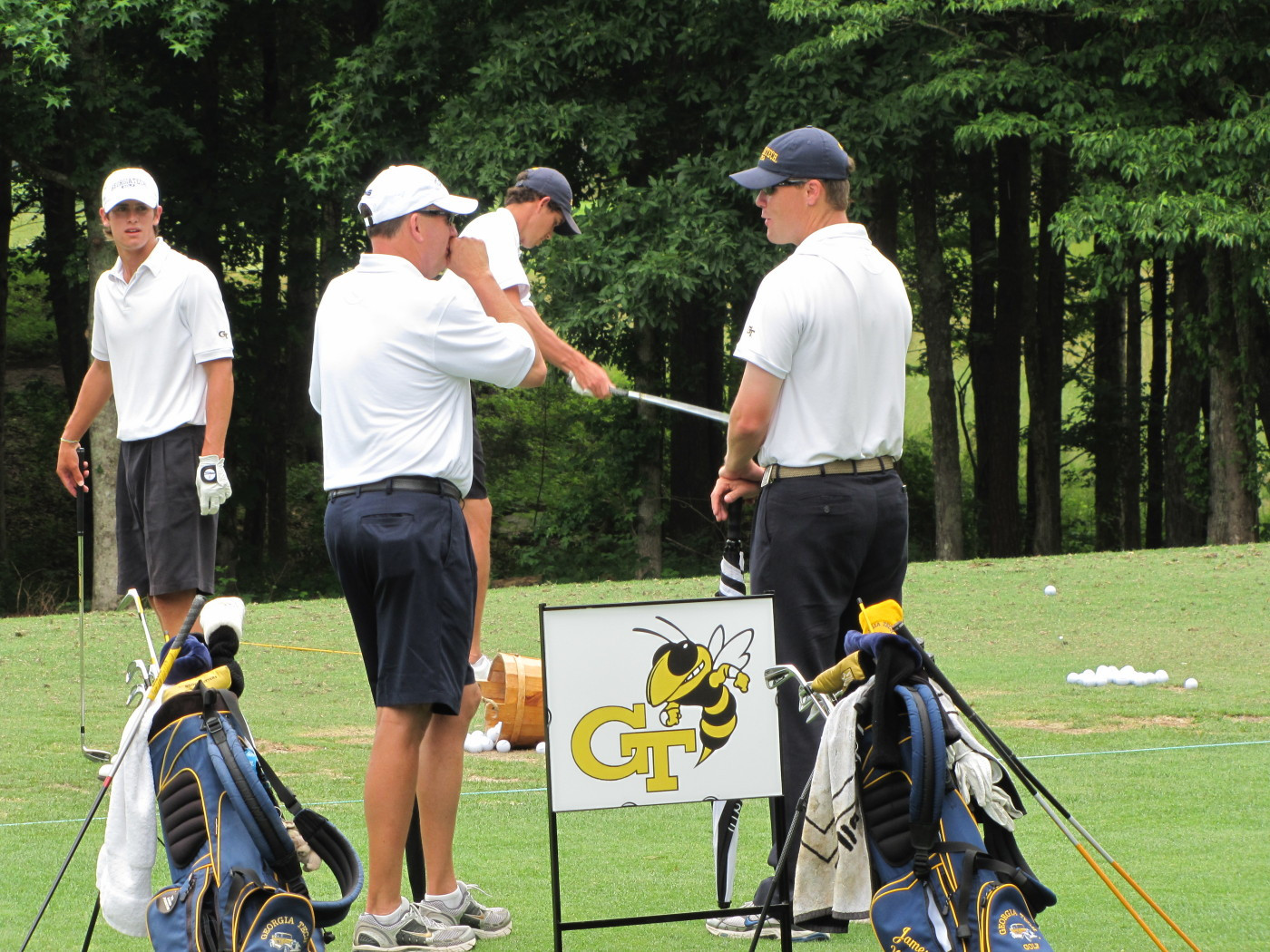 Head coach Bruce Heppler and assistant Christian Newton on the practice ranges before Round 1 of the 2010 NCAA Golf Championship, June 1, 2010.