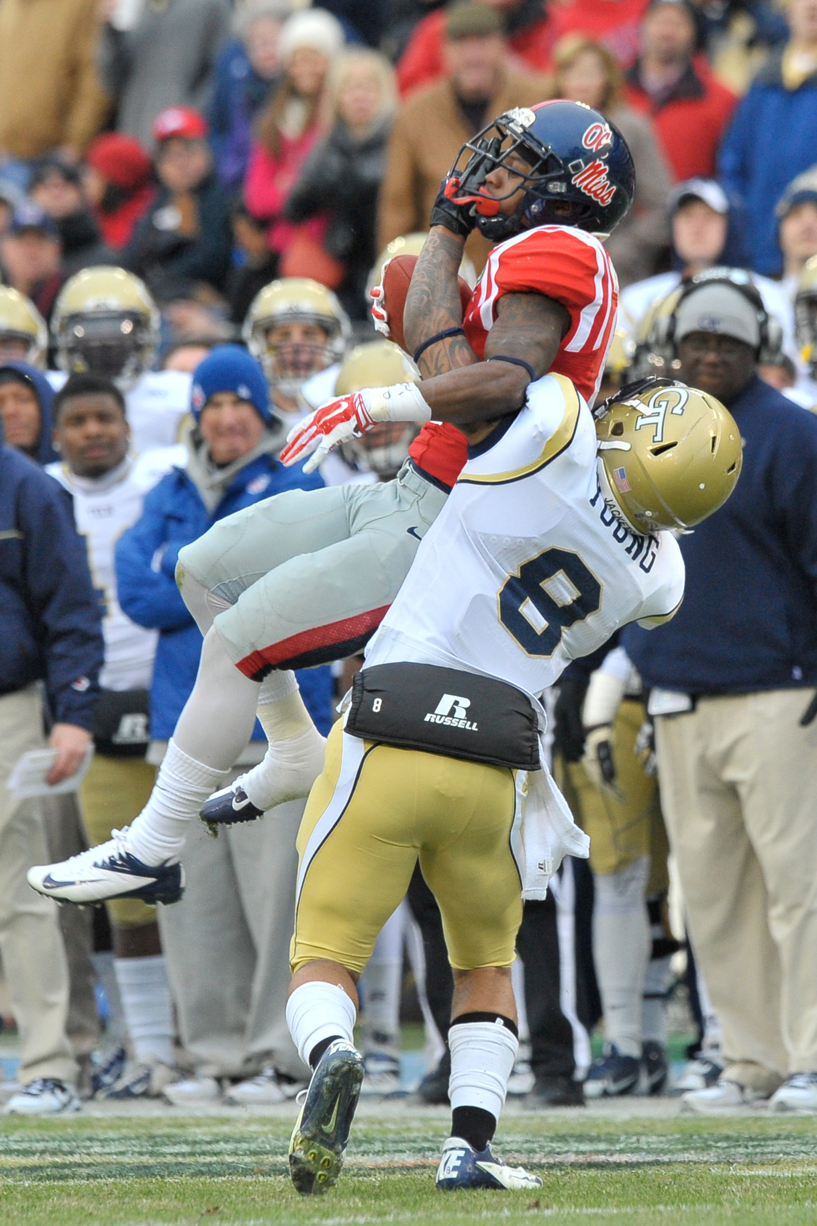 Georgia Tech Yellow Jackets cornerback Louis Young (8) defends a pass caught by Mississippi Rebels running back Jaylen Walton (6). Mandatory Credit: Jim Brown-USA TODAY Sports