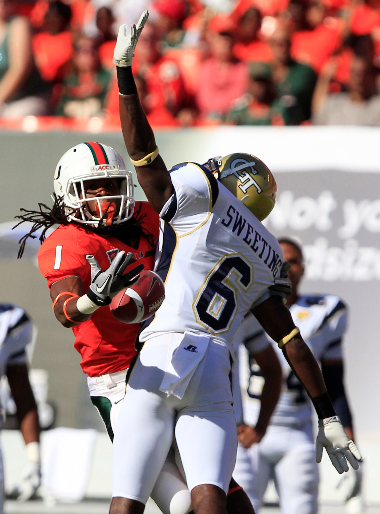 Miami wide receiver Allen Hurns (1) is unable to hang on to a pass as he is covered by Georgia Tech cornerback Rod Sweeting (6). (AP Photo/Wilfredo Lee)