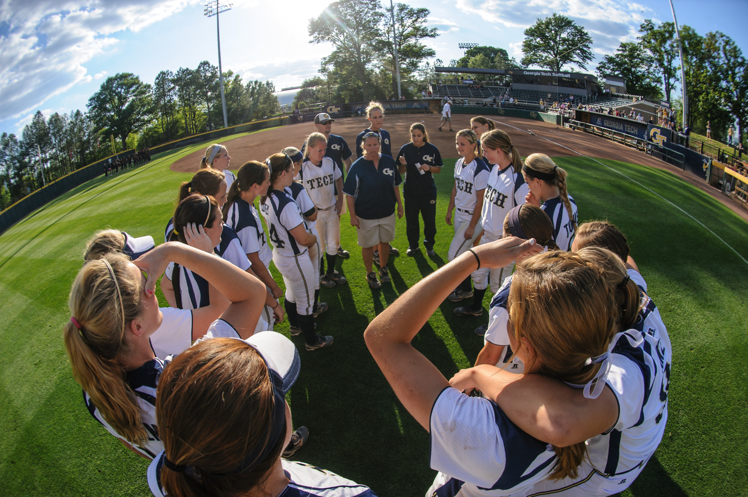 Coach Perkins speaks to the team after the victory.